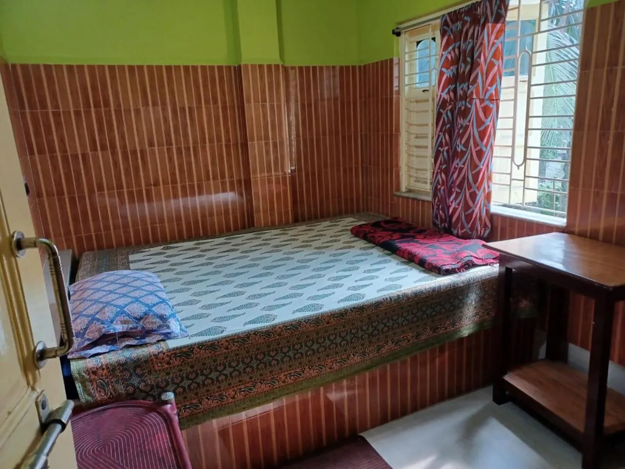 Bed in Jagannath Guest House