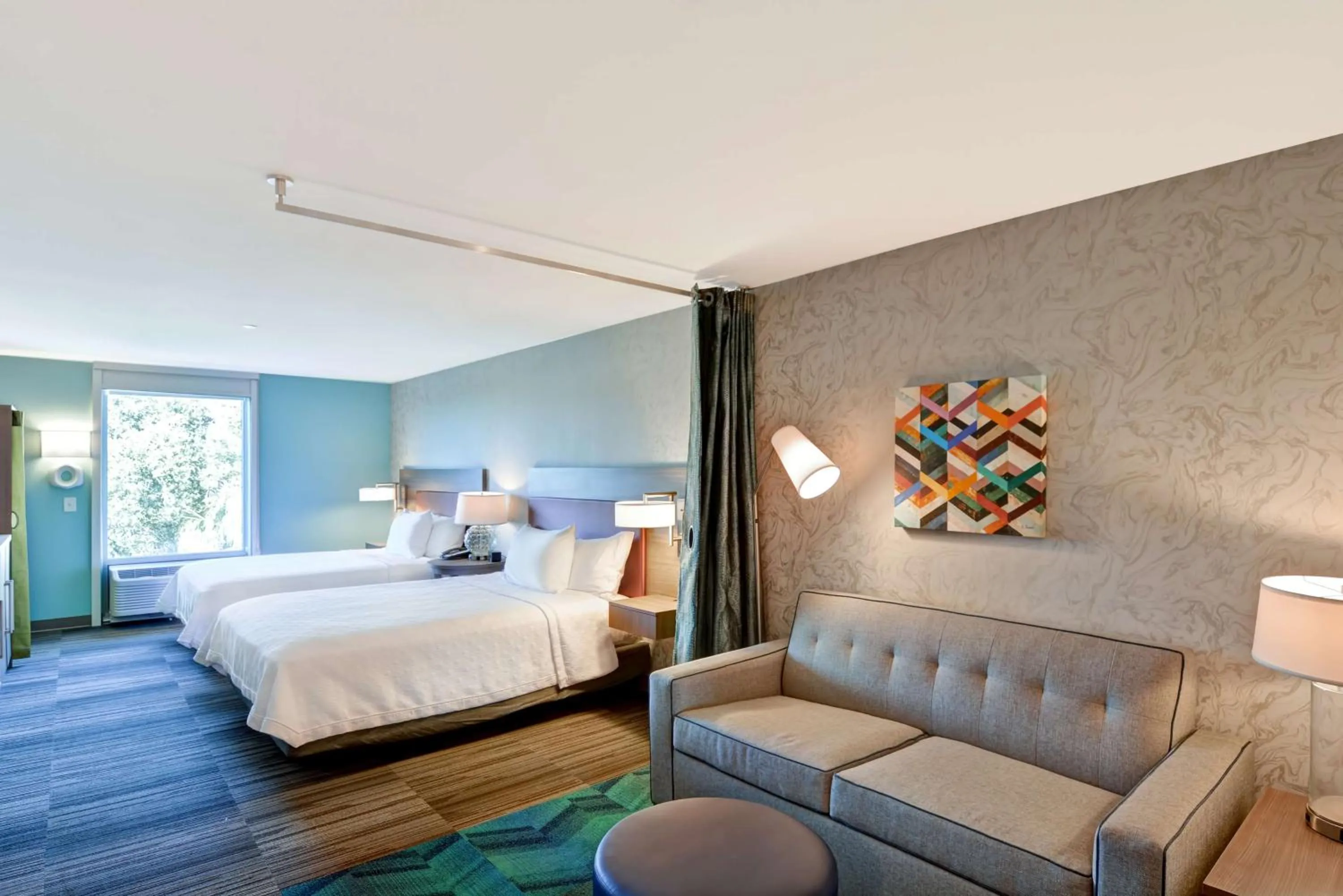 Living room, Bed in Home2 Suites By Hilton Tampa USF Near Busch Gardens