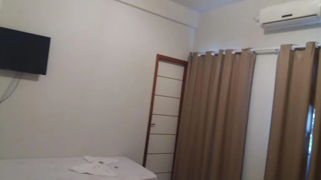 air conditioner, Bed in Hotel Alelos - Ituaçu Bahia