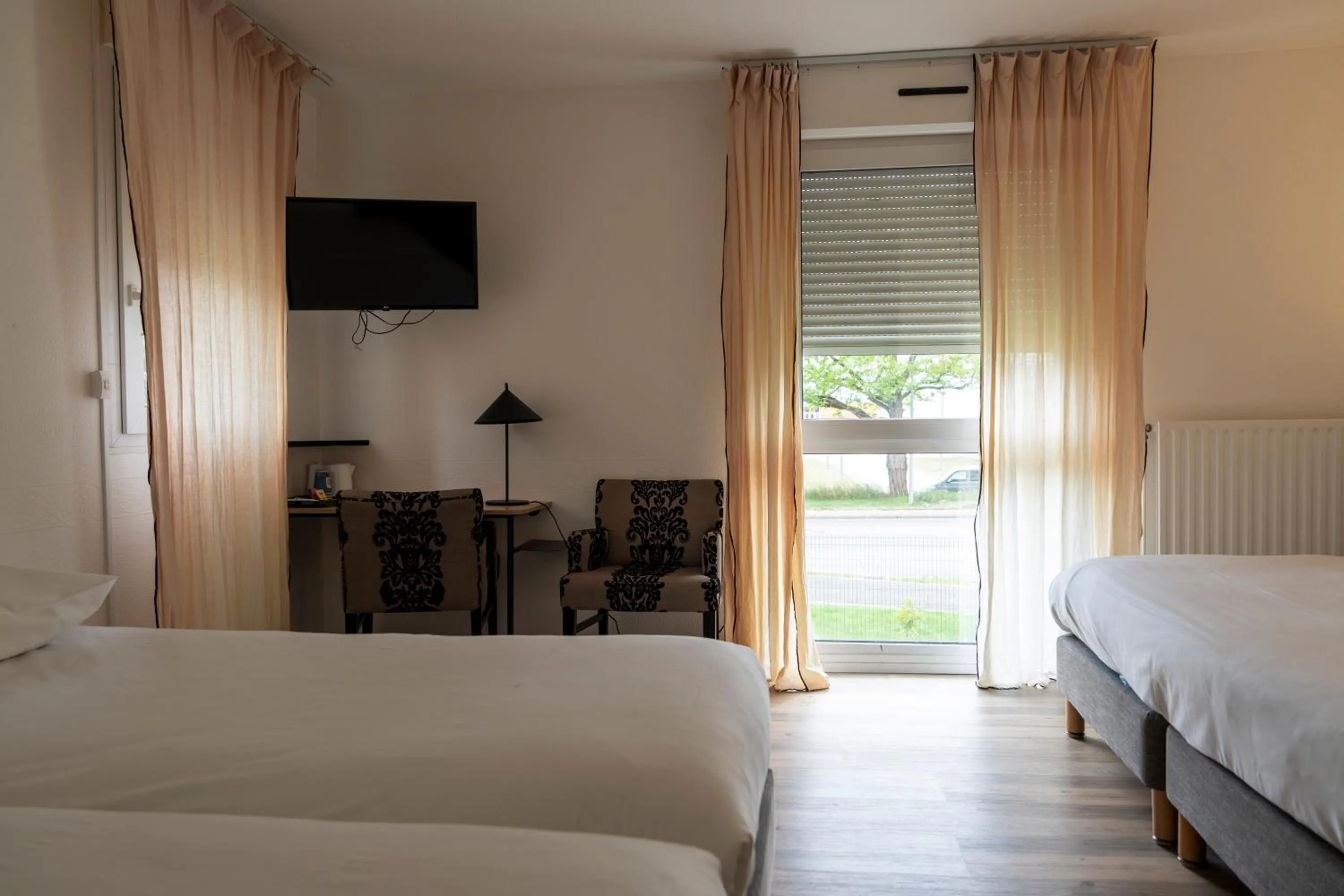 Bed in Kyriad Nuits Saint Georges Dijon Sud