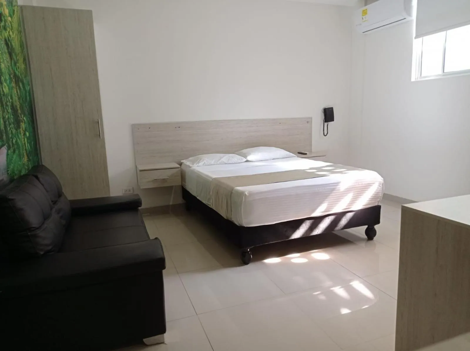 Bed in Hotel Granada Loft