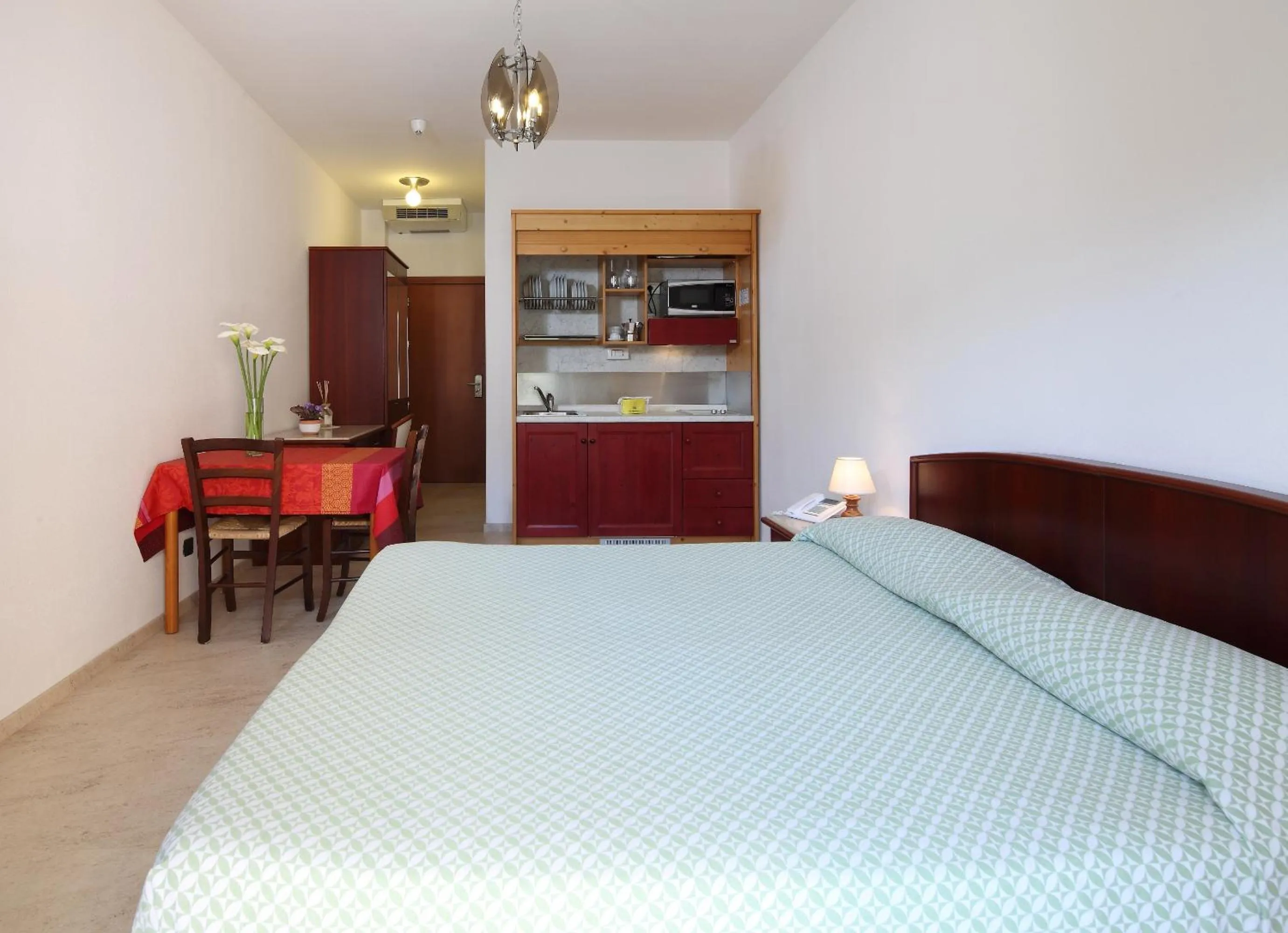 Kitchen or kitchenette, Bed in Residence Hotel Kriss