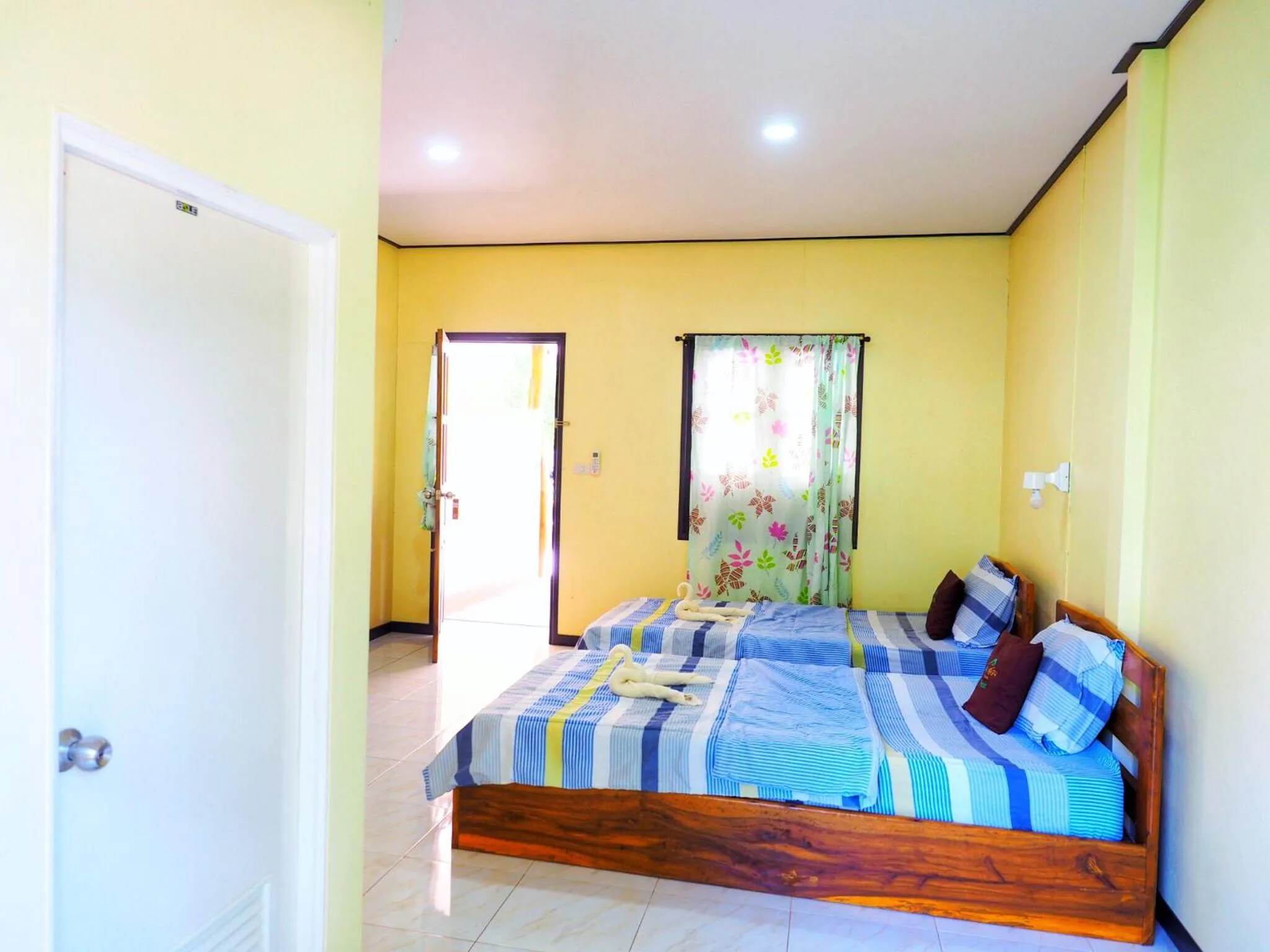 Bed in Baansuan Resort