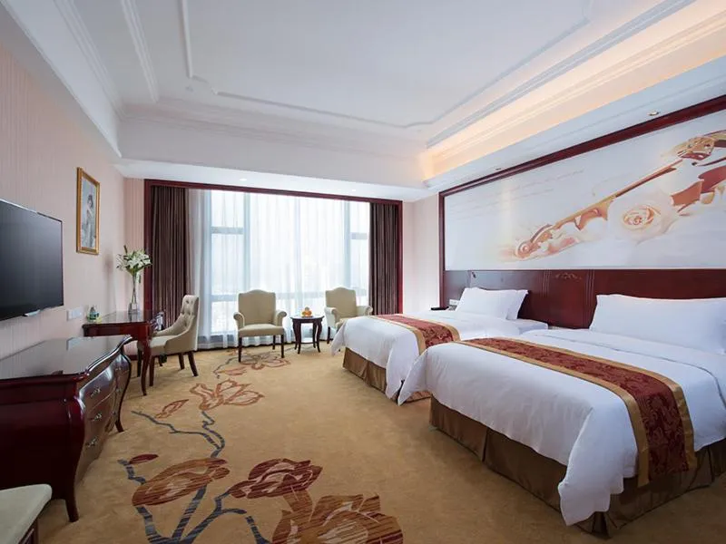Bed in Vienna International Hotel Maoming Xinyi Xinshang Road