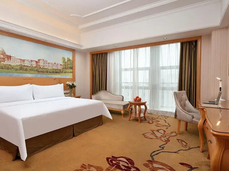 Bed in Vienna International Hotel Jiujiang Shili Street Bed in Vienna International Hotel Jiujiang Shili Street