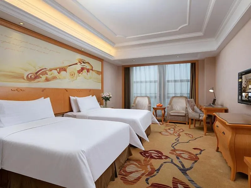 Bed in Vienna International Hotel Jiujiang Shili Street