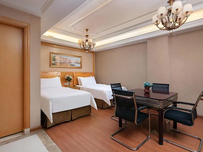 Bed in Vienna International Hotel Jiujiang Shili Street