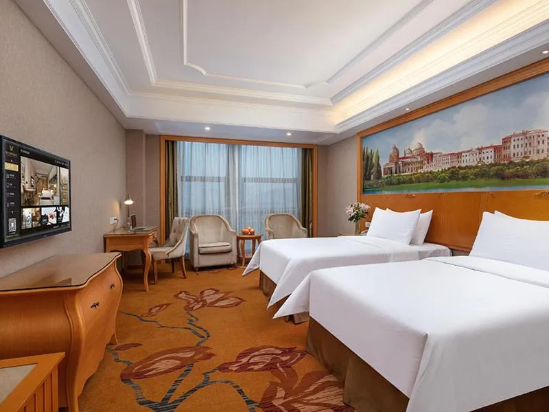 Bed in Vienna International Hotel Jiujiang Shili Street
