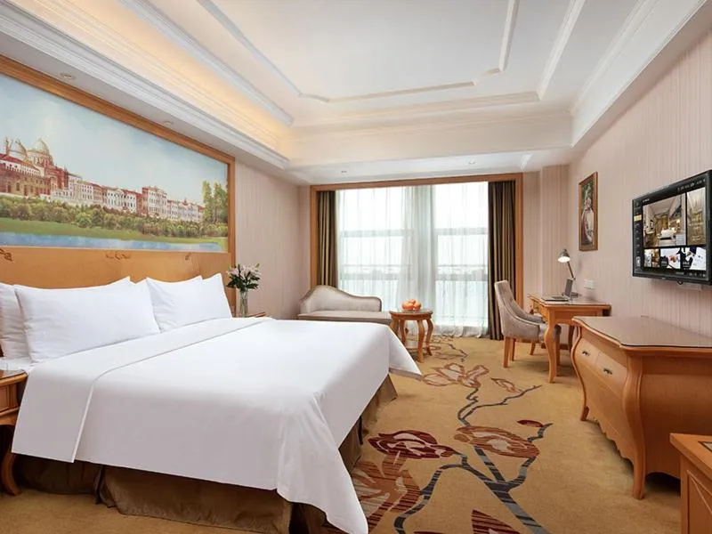 Bed in Vienna International Hotel Jiujiang Shili Street