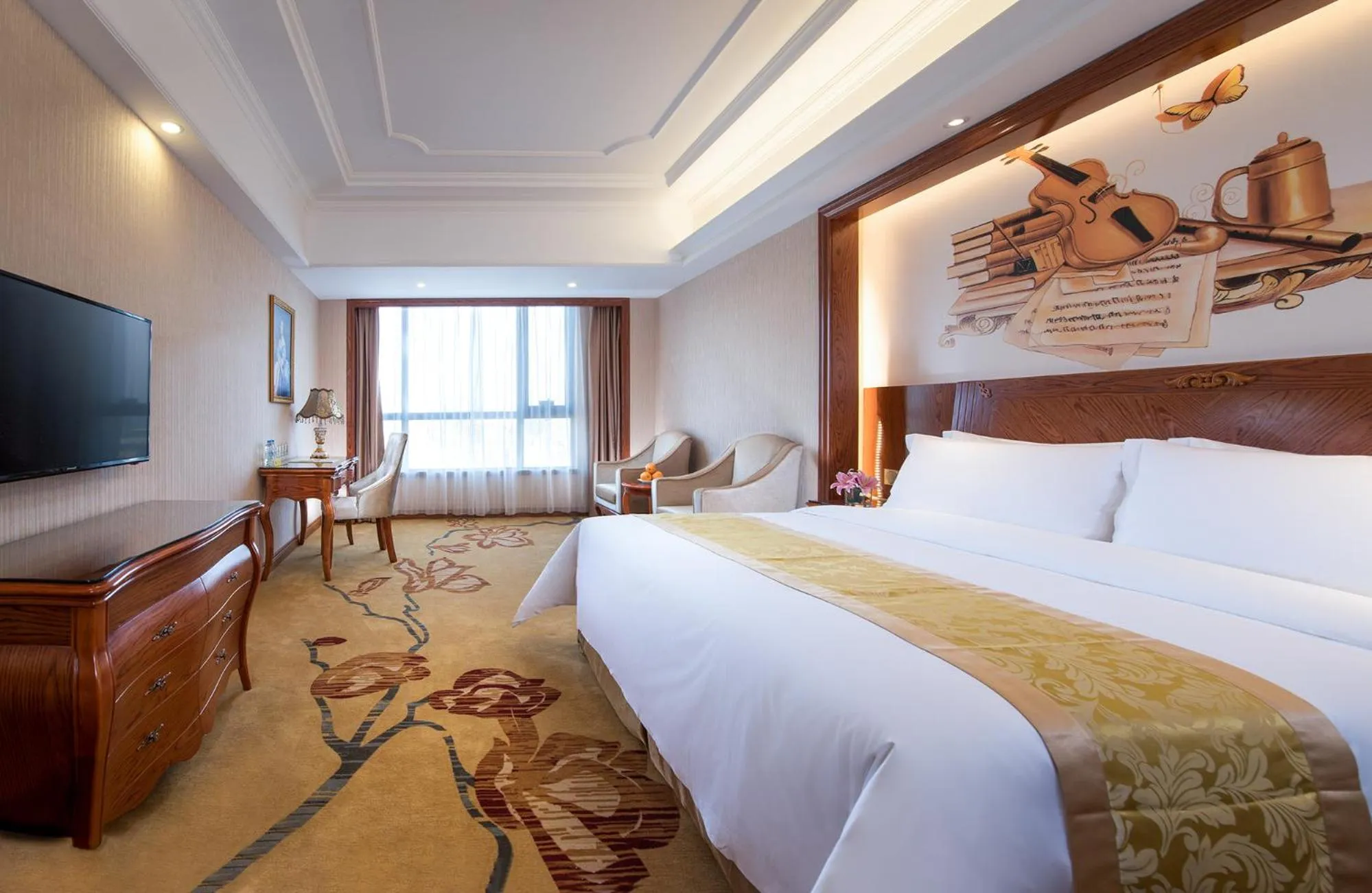 Bed in Vienna International Hotel Jieyang Yangmei Jade hotel