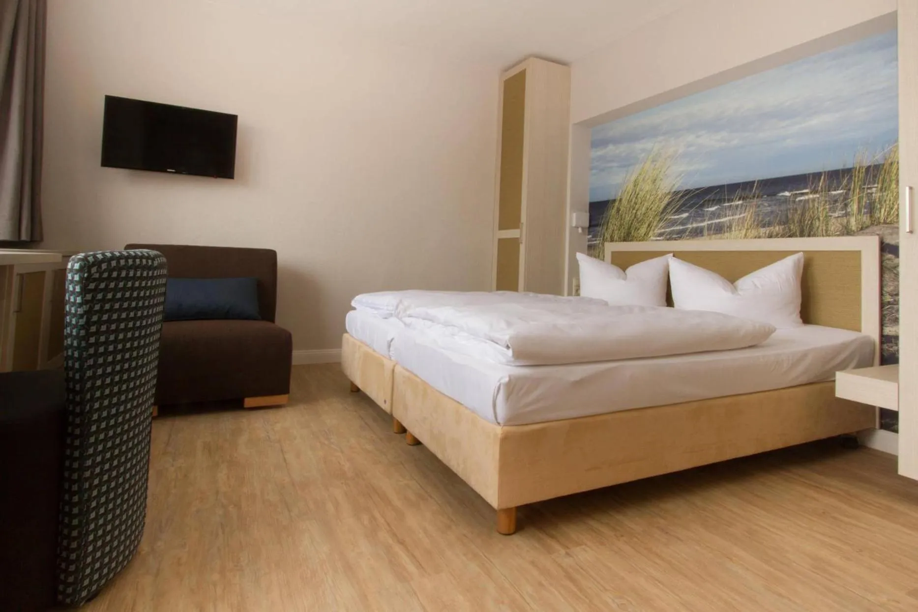 Photo of the whole room, Bed in Hotel Haus am Meer