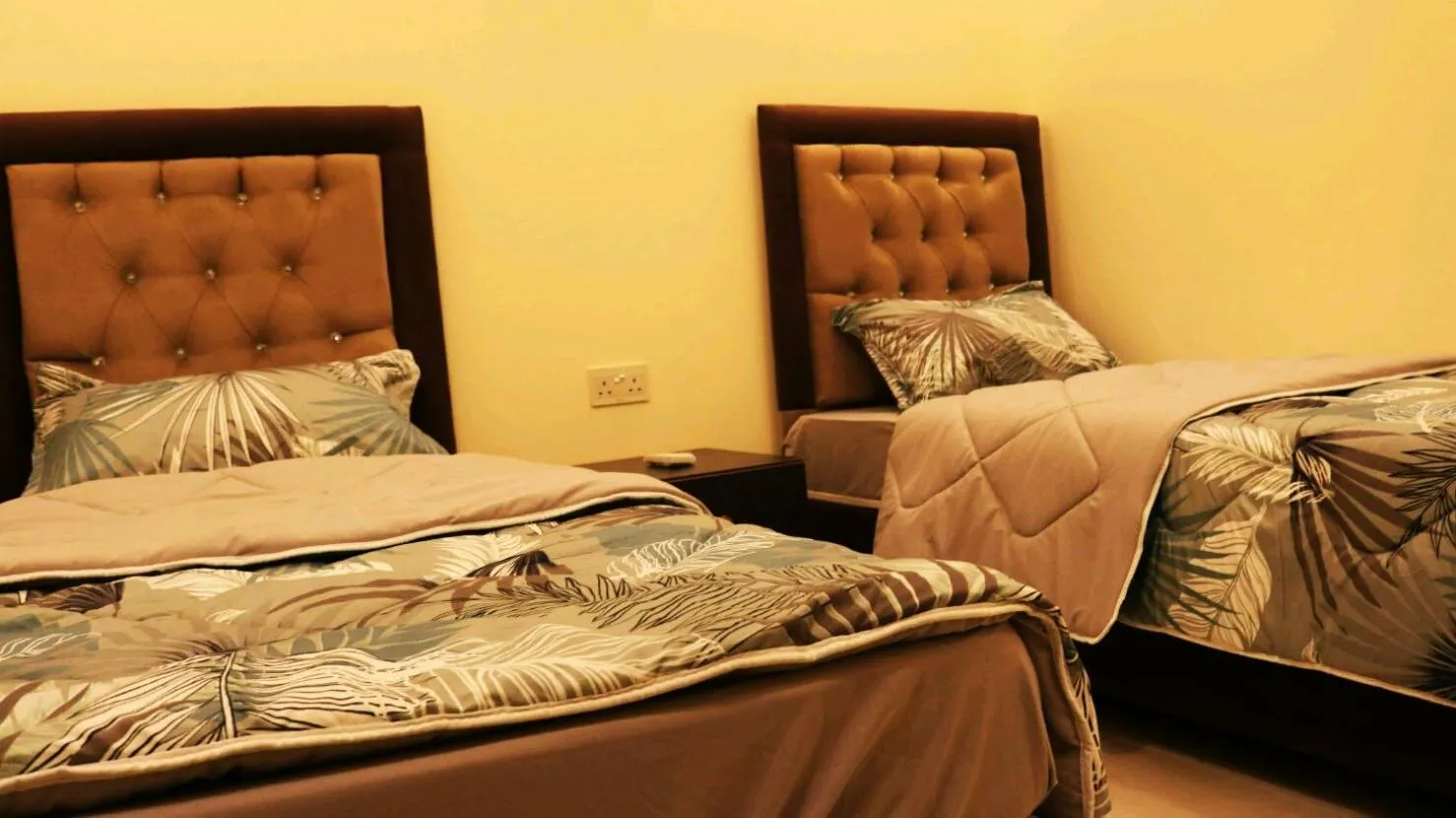 Bedroom, Bed in Al Riyati Hotel Apartments