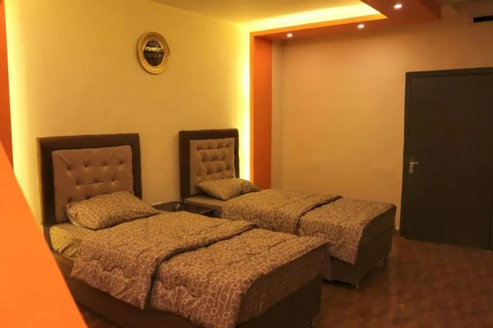 Bed in Al Riyati Hotel Apartments