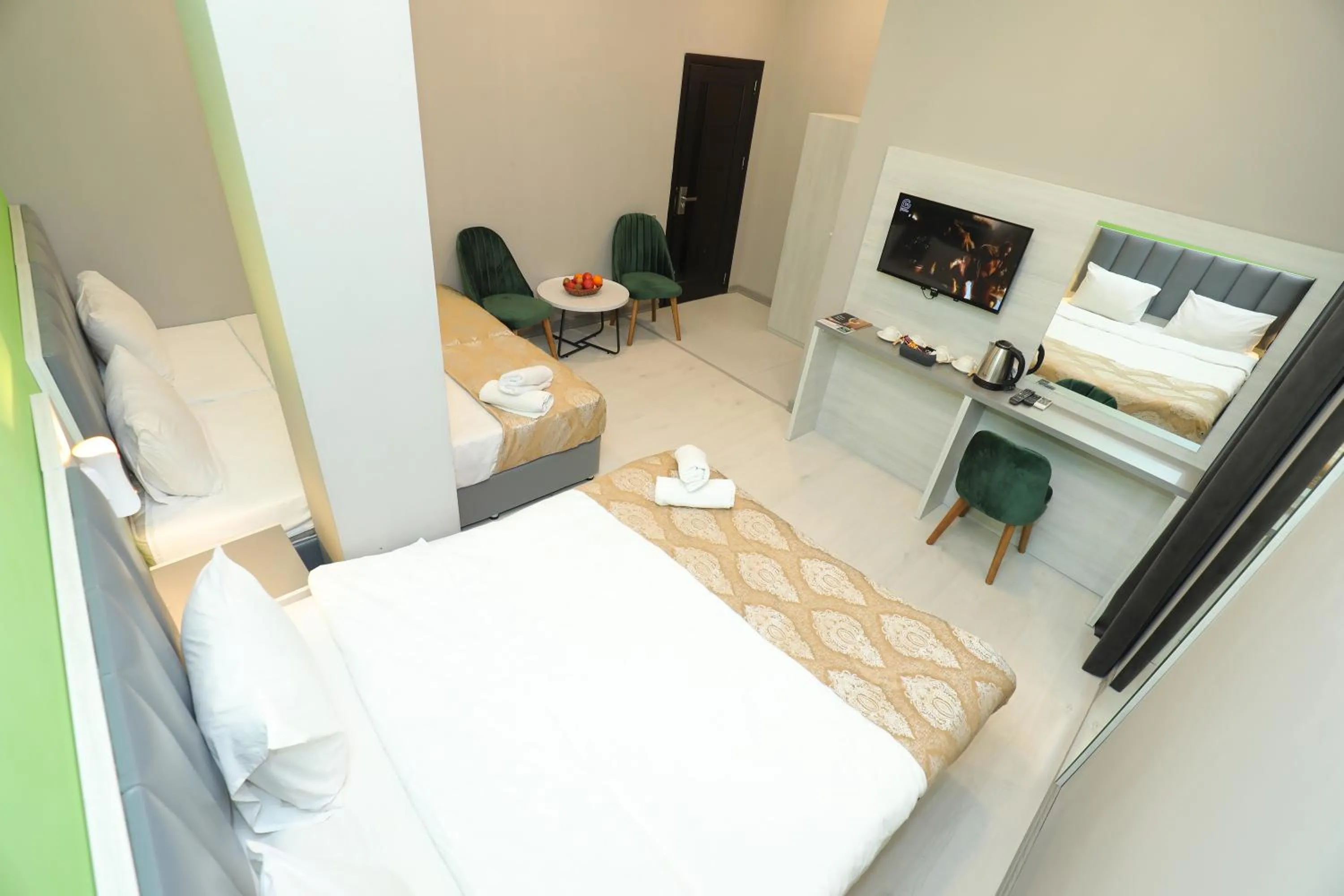 TV and multimedia, Bed in Istanbul Gold Hotel Baku