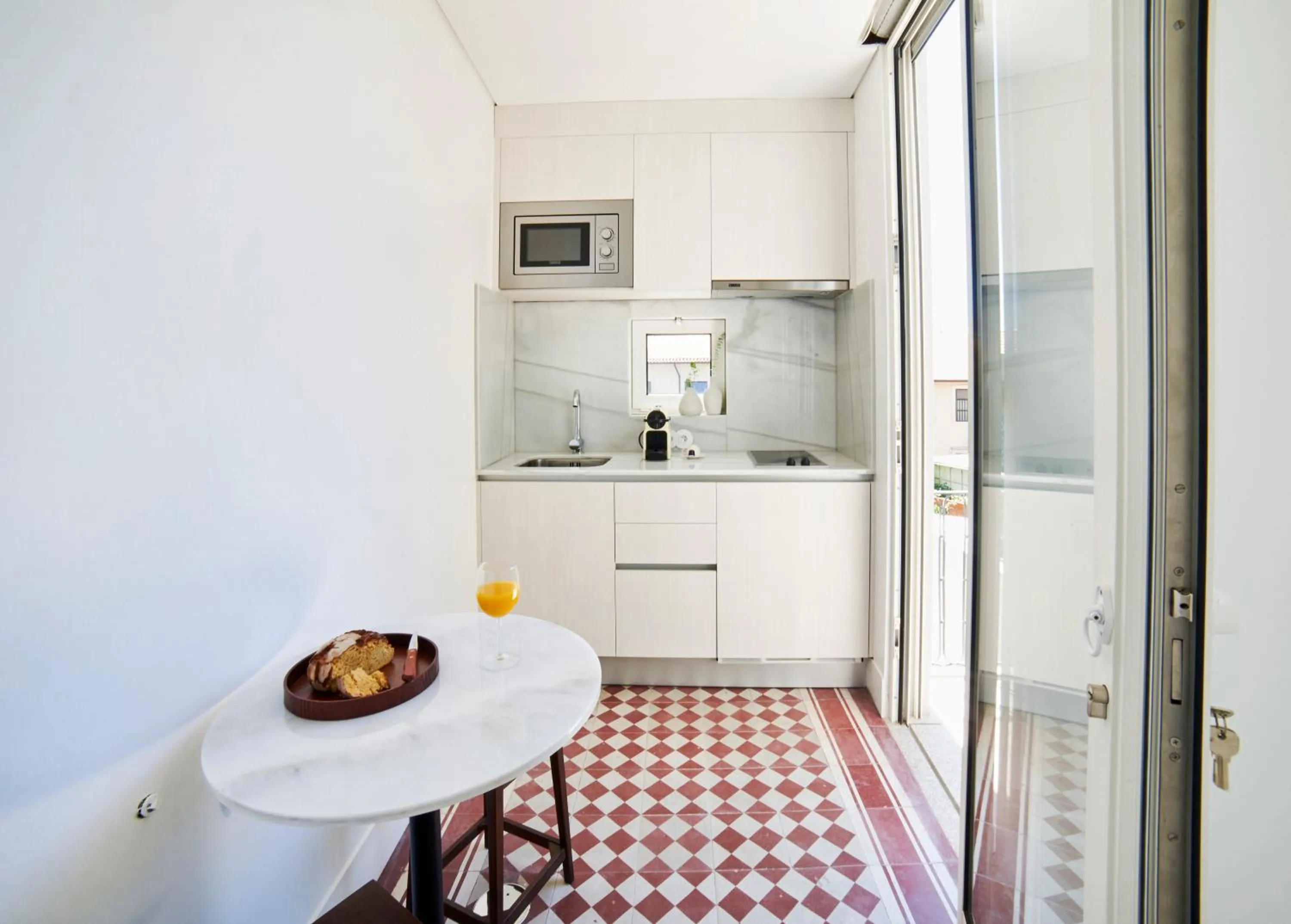 Kitchen or kitchenette in Pause Apartments