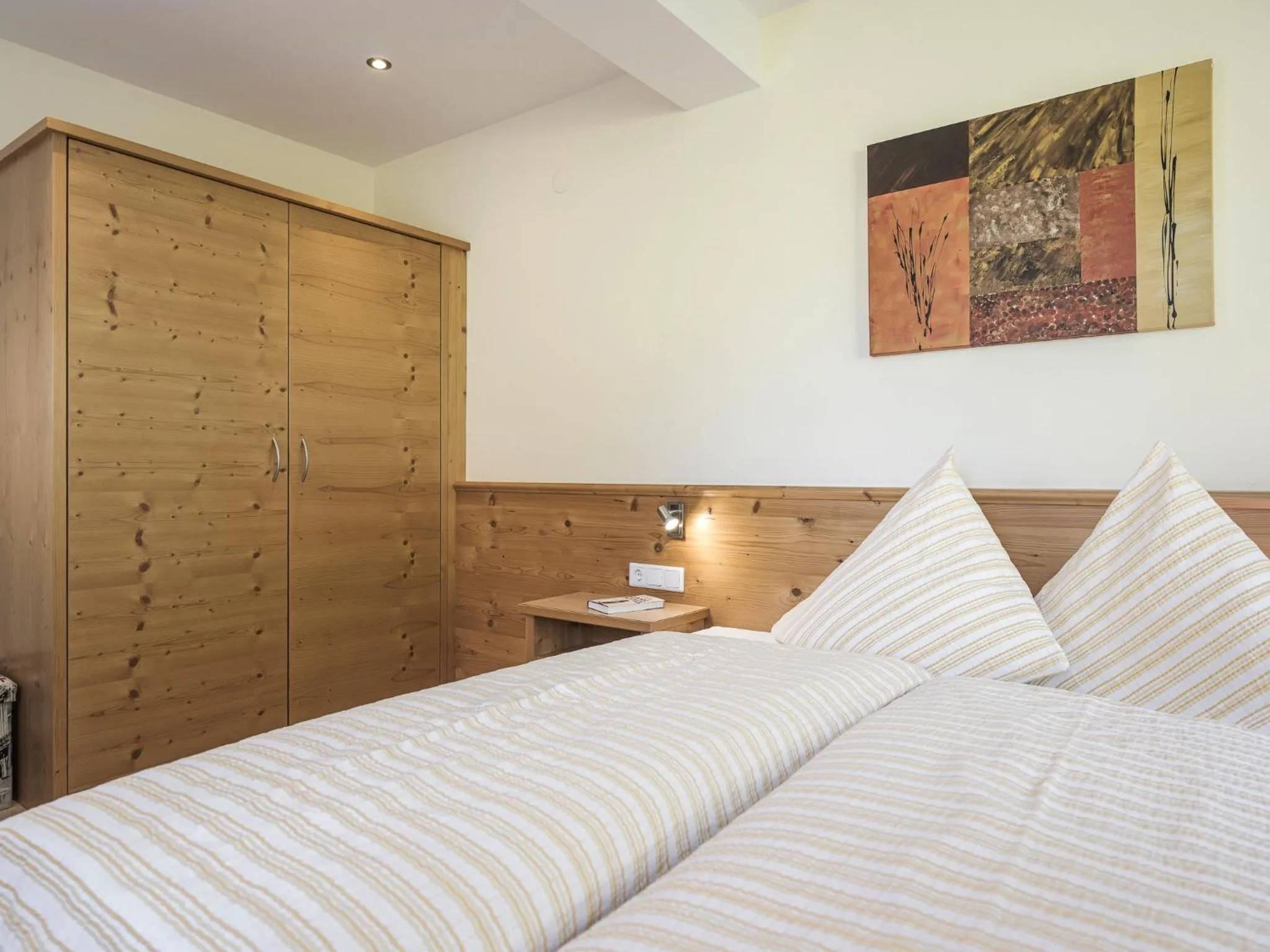 Bed in Appartementhaus Sennhüttn