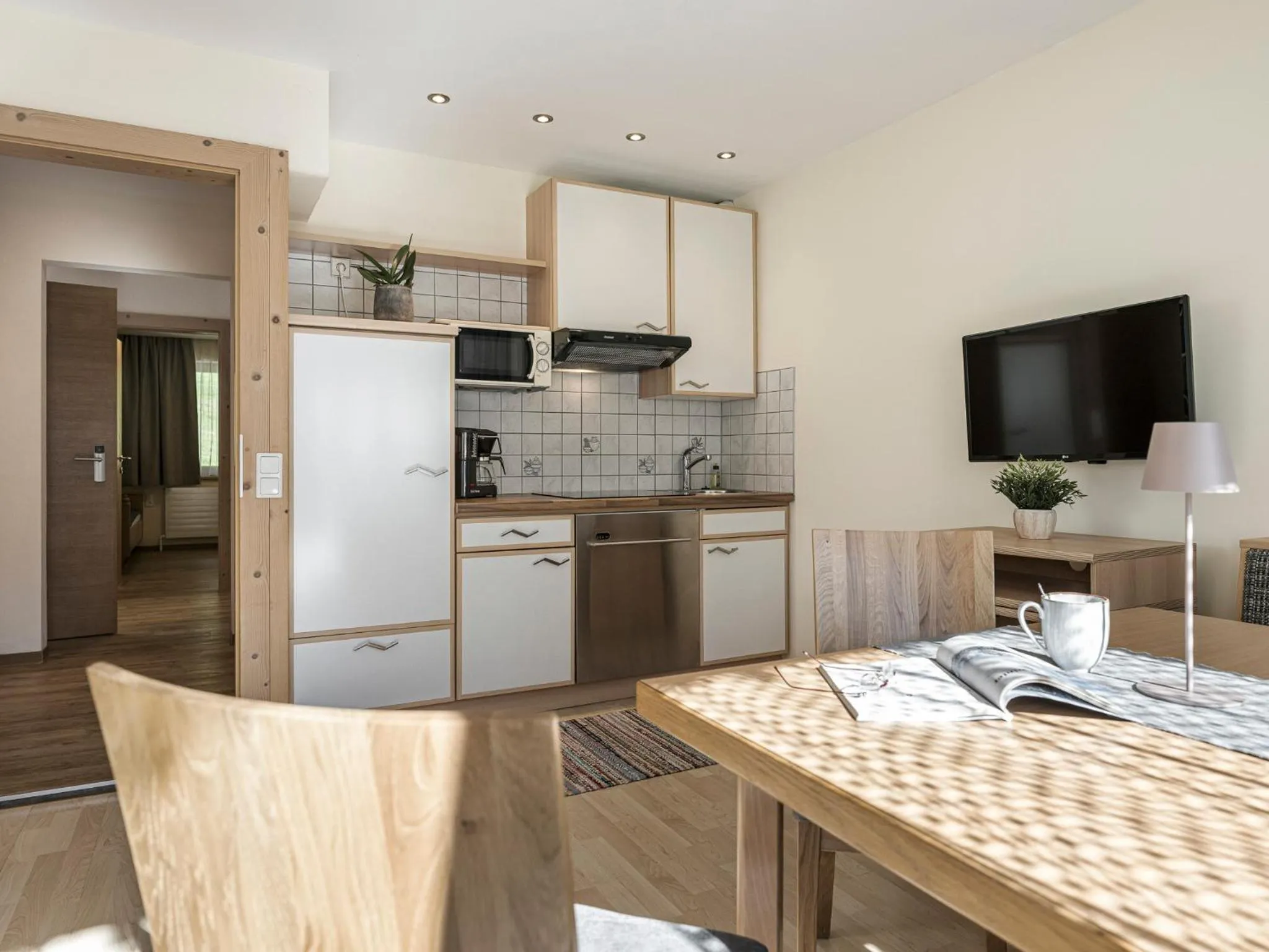 Kitchen or kitchenette in Appartementhaus Sennhüttn