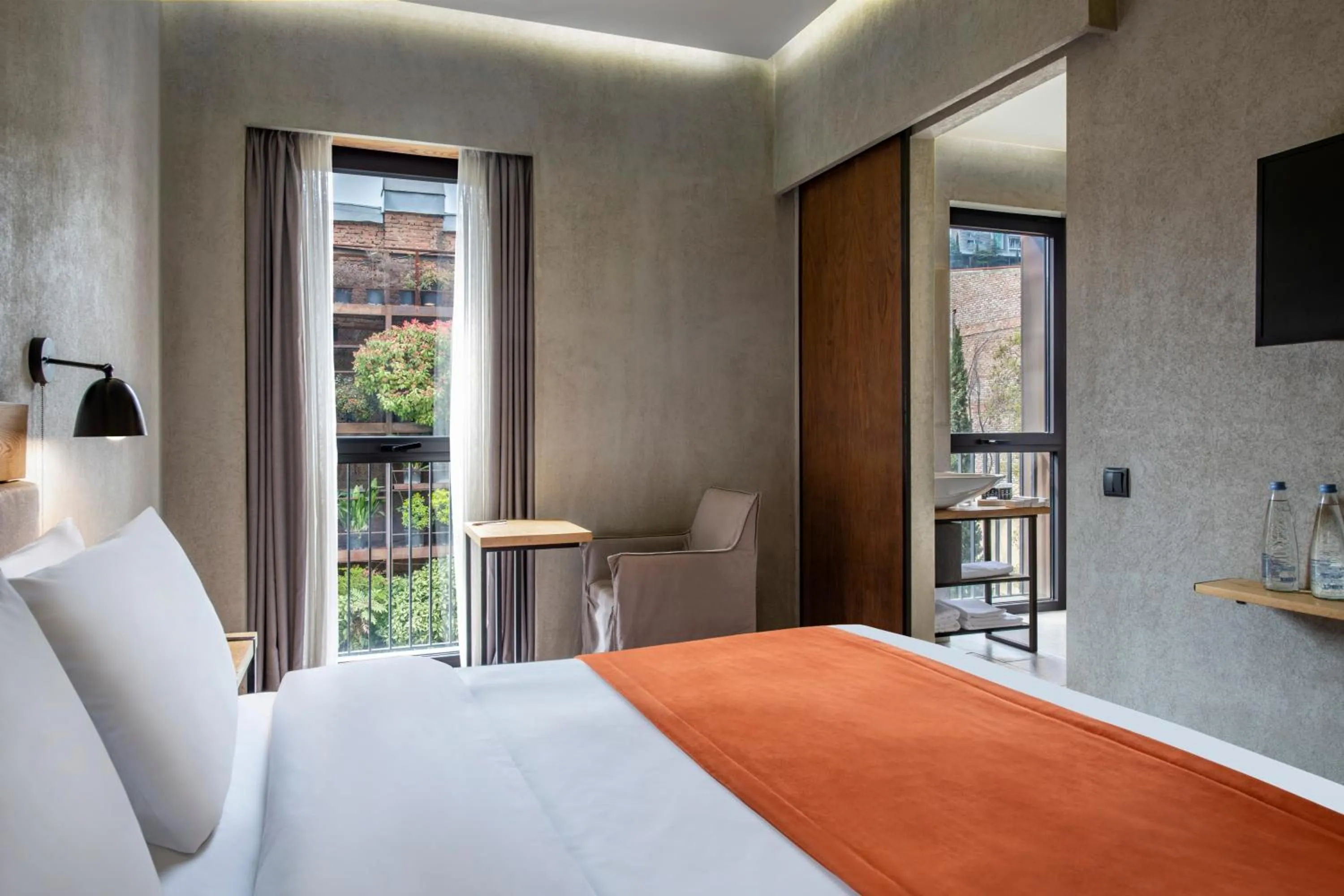 Bed in IOTA Hotel Tbilisi