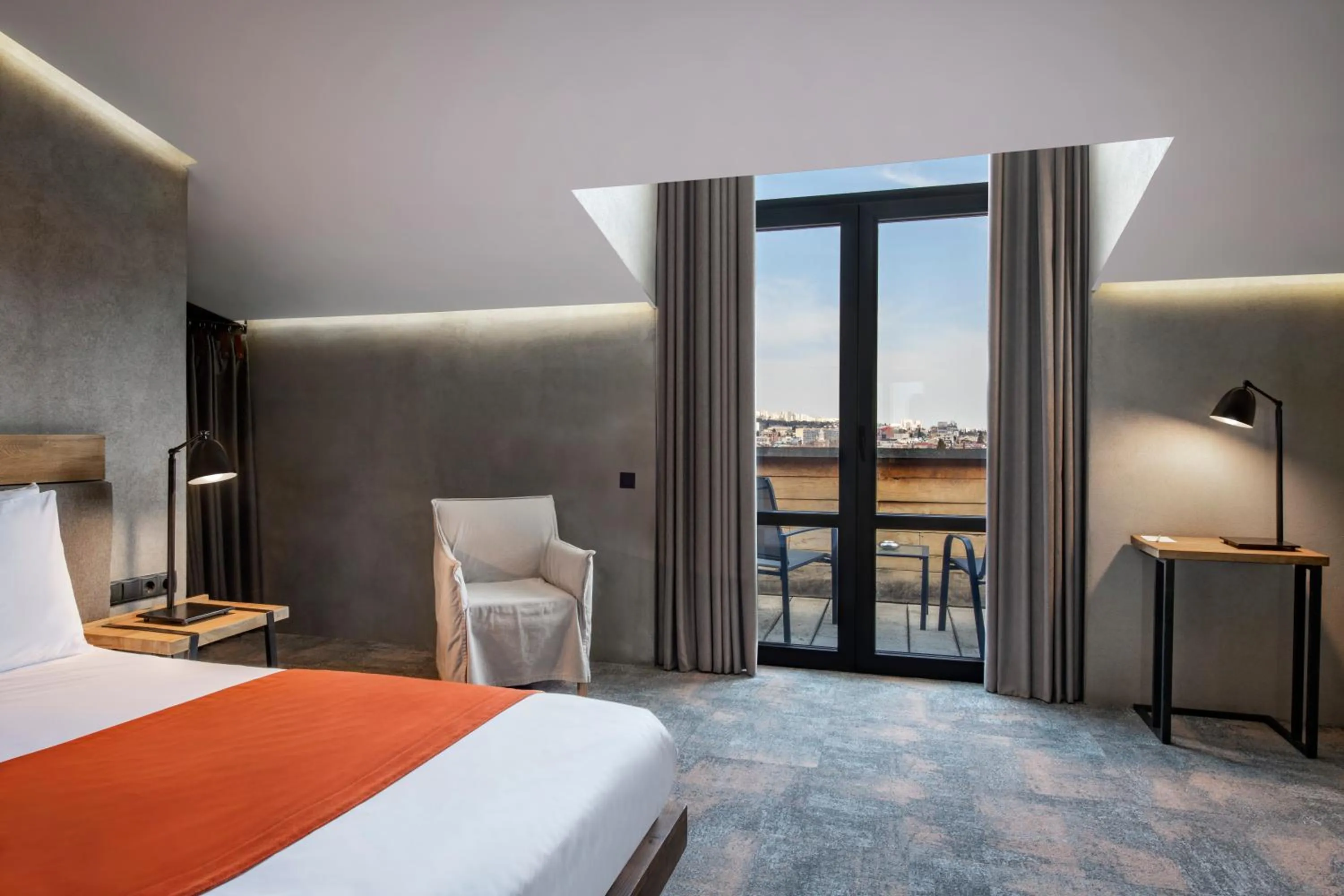 Bed in IOTA Hotel Tbilisi