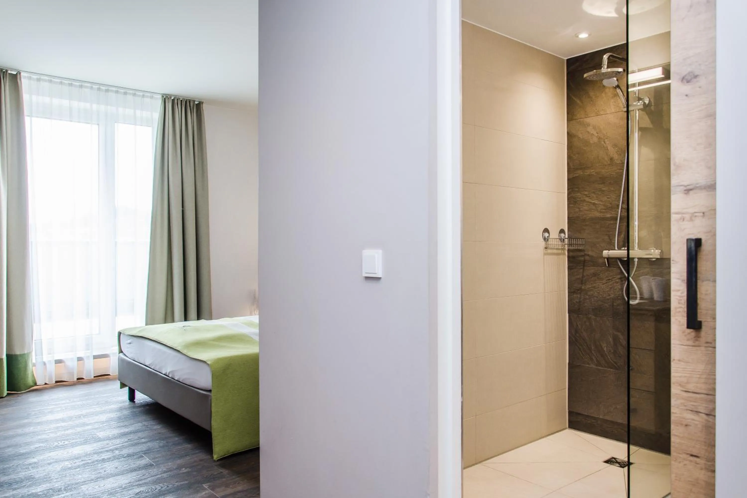 Bathroom, Bed in Gasthaus Forster am See - Eching bei Landshut