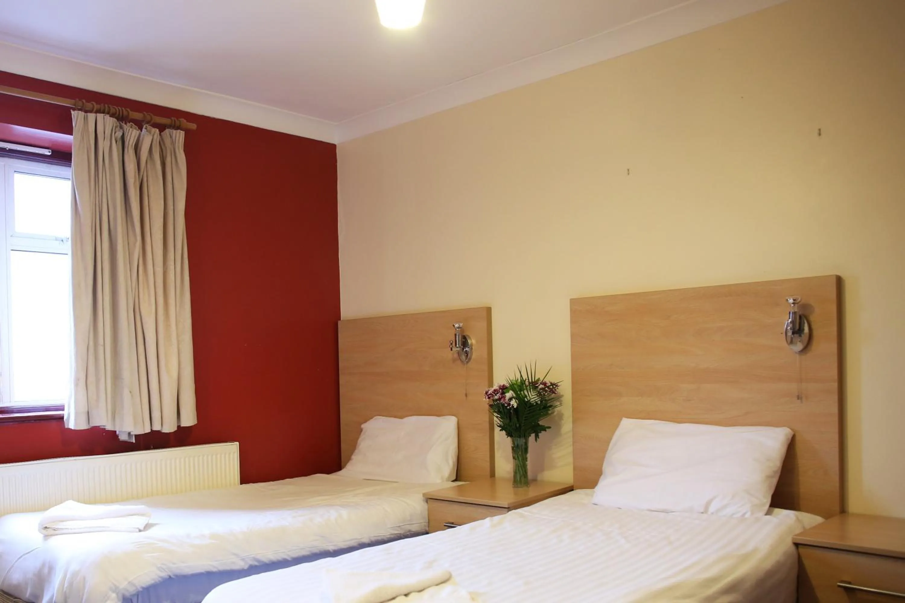 Bed in City Inn Express Hotel