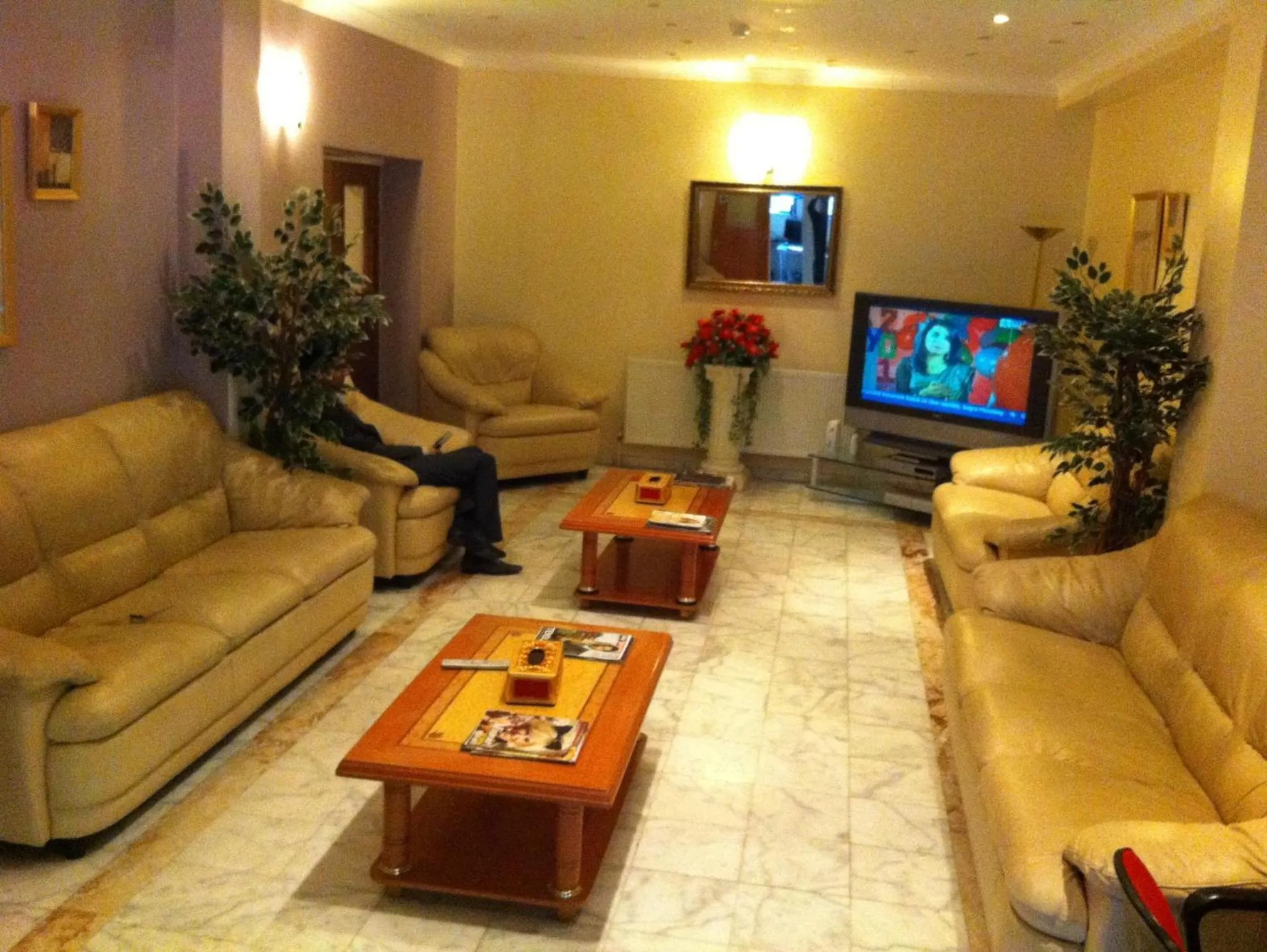 Communal lounge/ TV room in City Inn Express Hotel