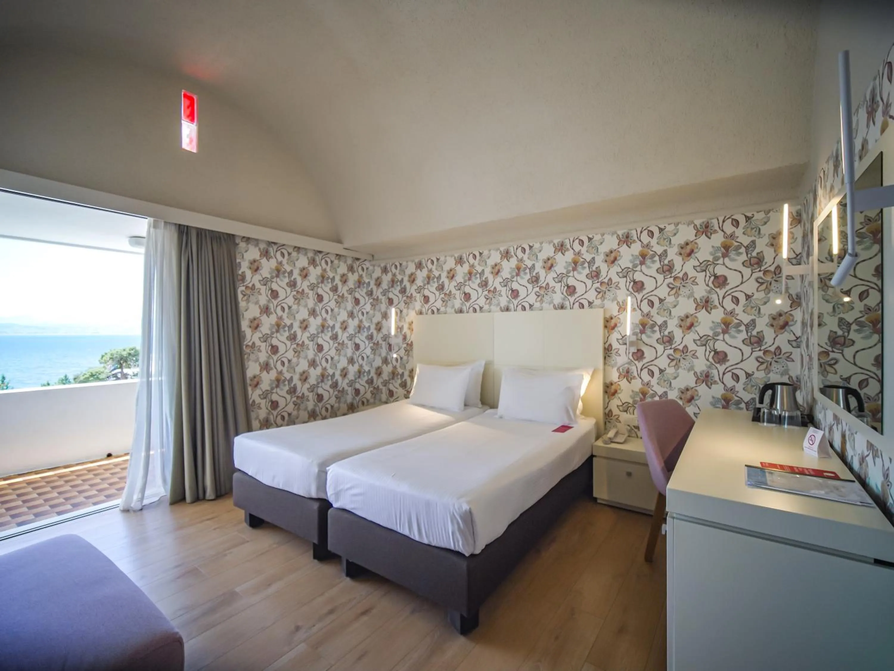 Bed in Ramada Loutraki Poseidon Resort