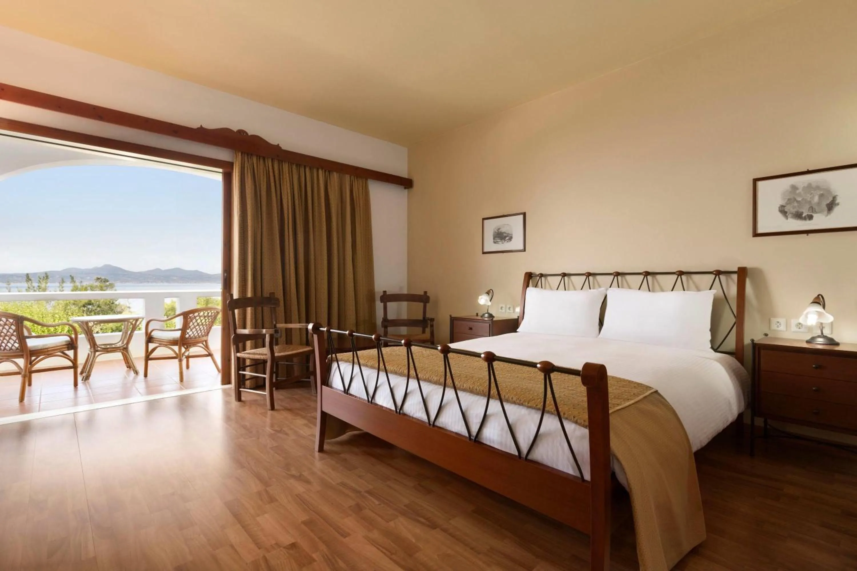 Photo of the whole room, Bed in Ramada Loutraki Poseidon Resort
