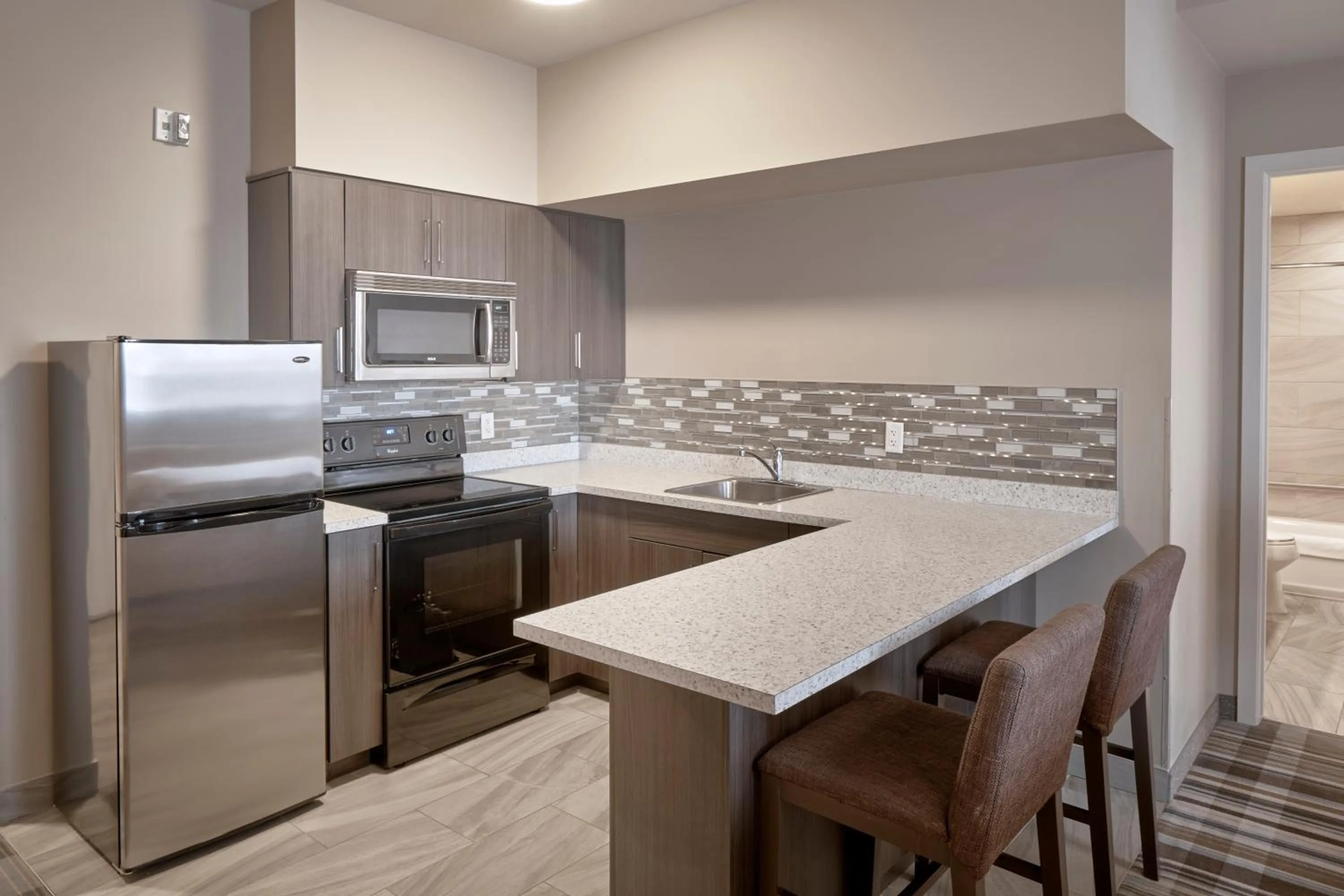 Kitchen or kitchenette in Fairfield Inn & Suites by Marriott Airdrie