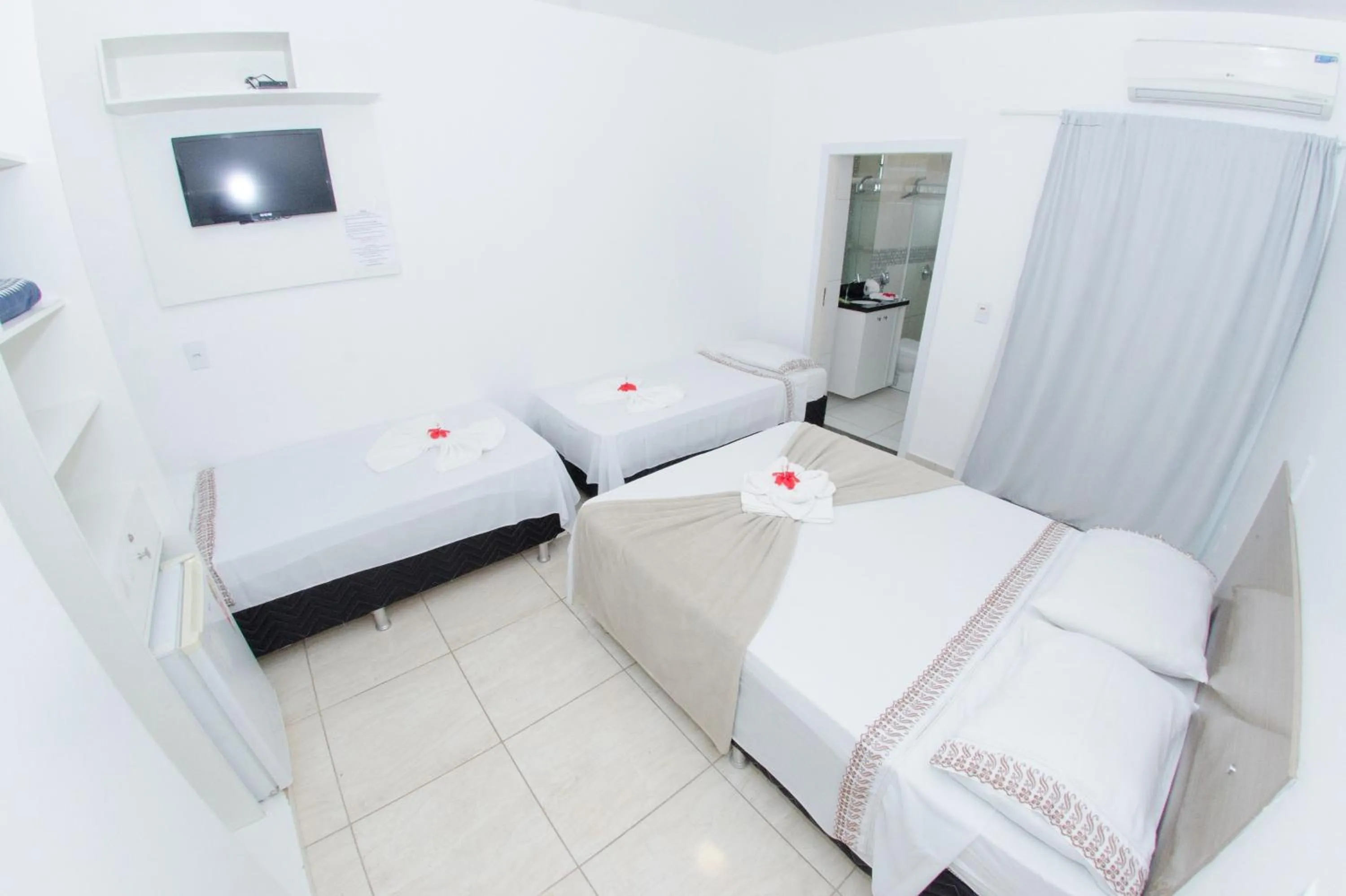 Bed in Pousada Nascer do Sol