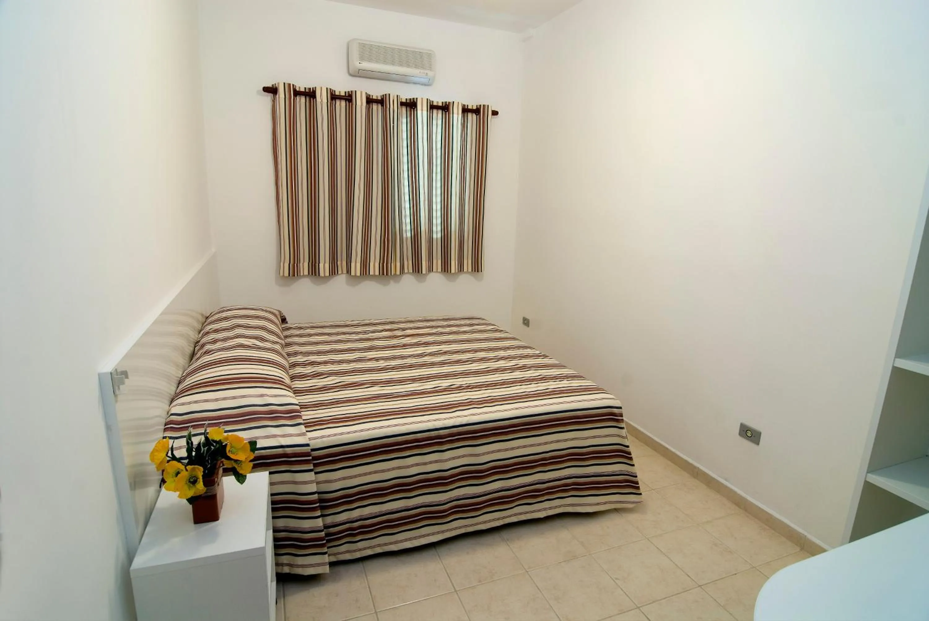 Bedroom, Bed in Bella Casa Flat Service