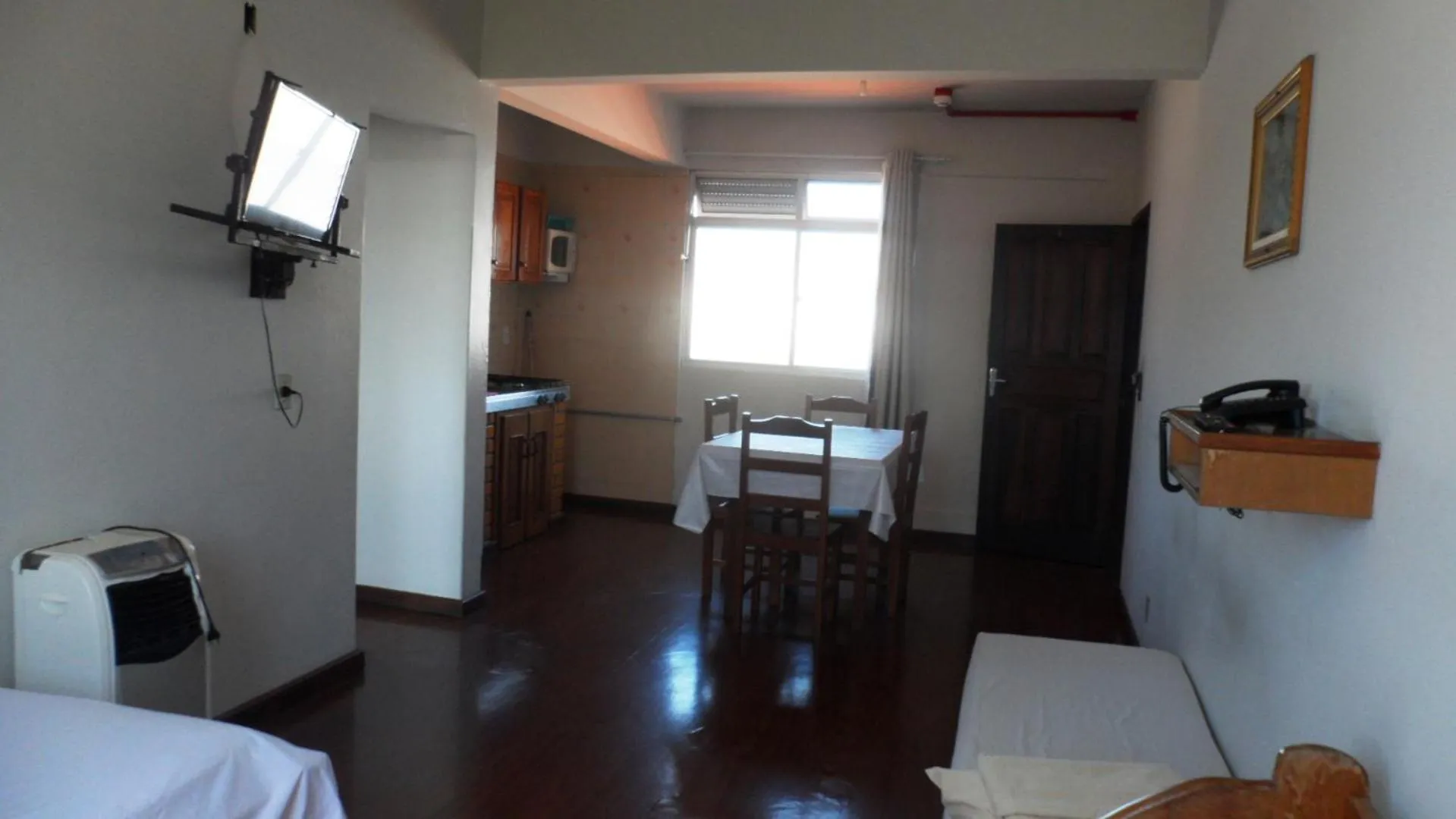 Communal lounge/ TV room, Bed in Apart Hotel La Cabana