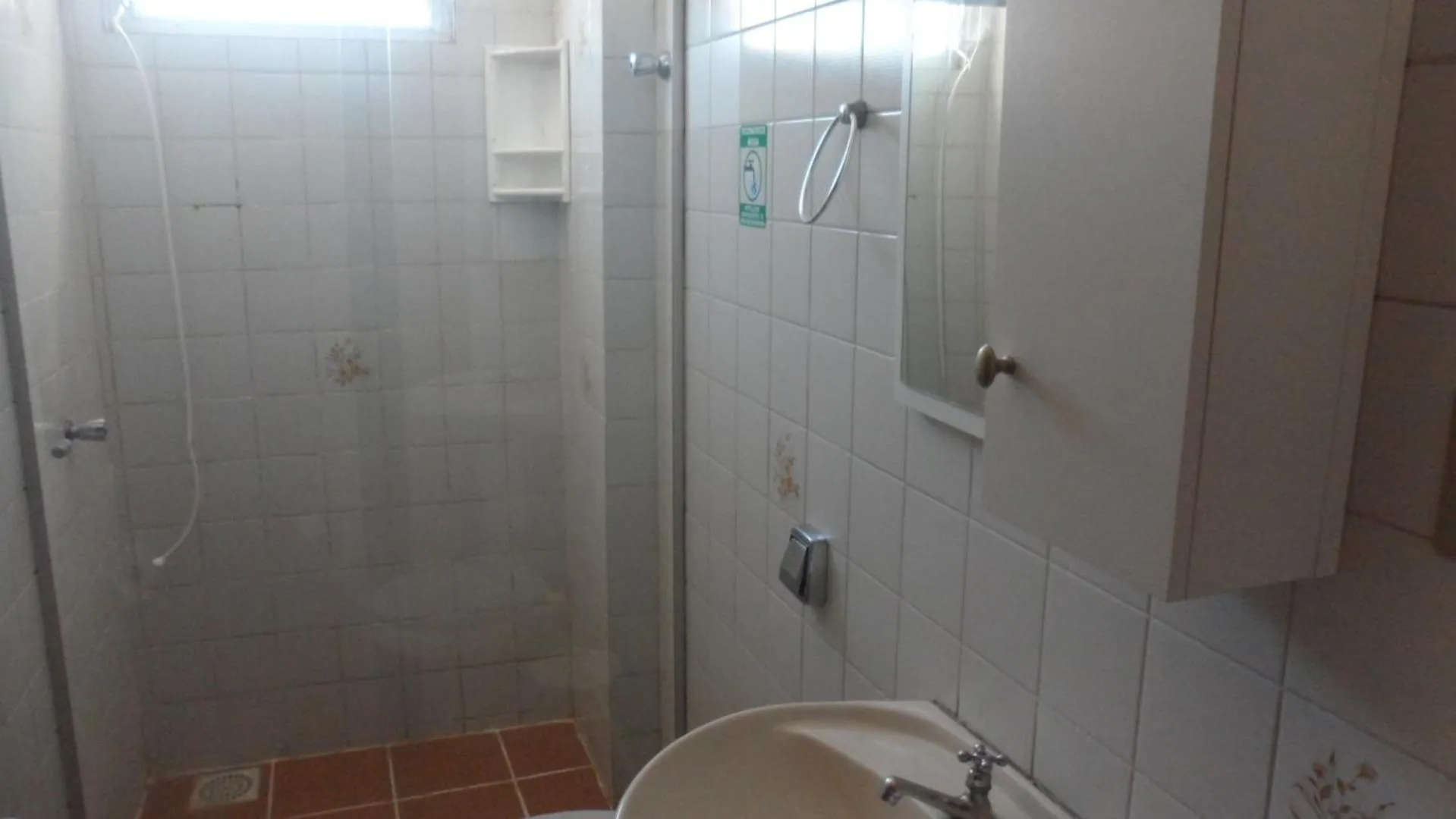 Shower in Apart Hotel La Cabana