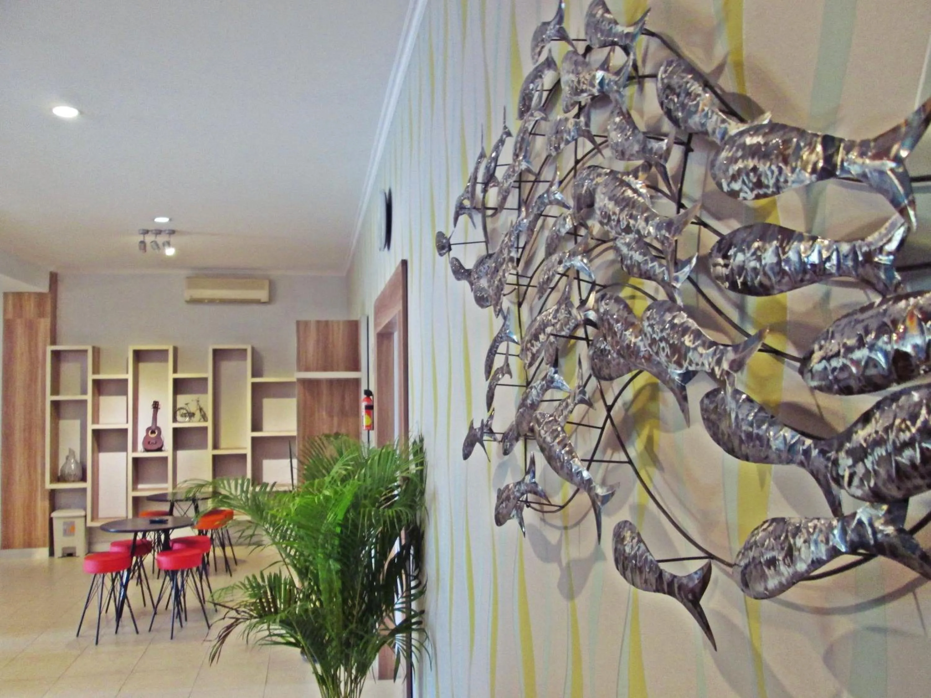 Communal lounge/ TV room in The Alley City Hotel