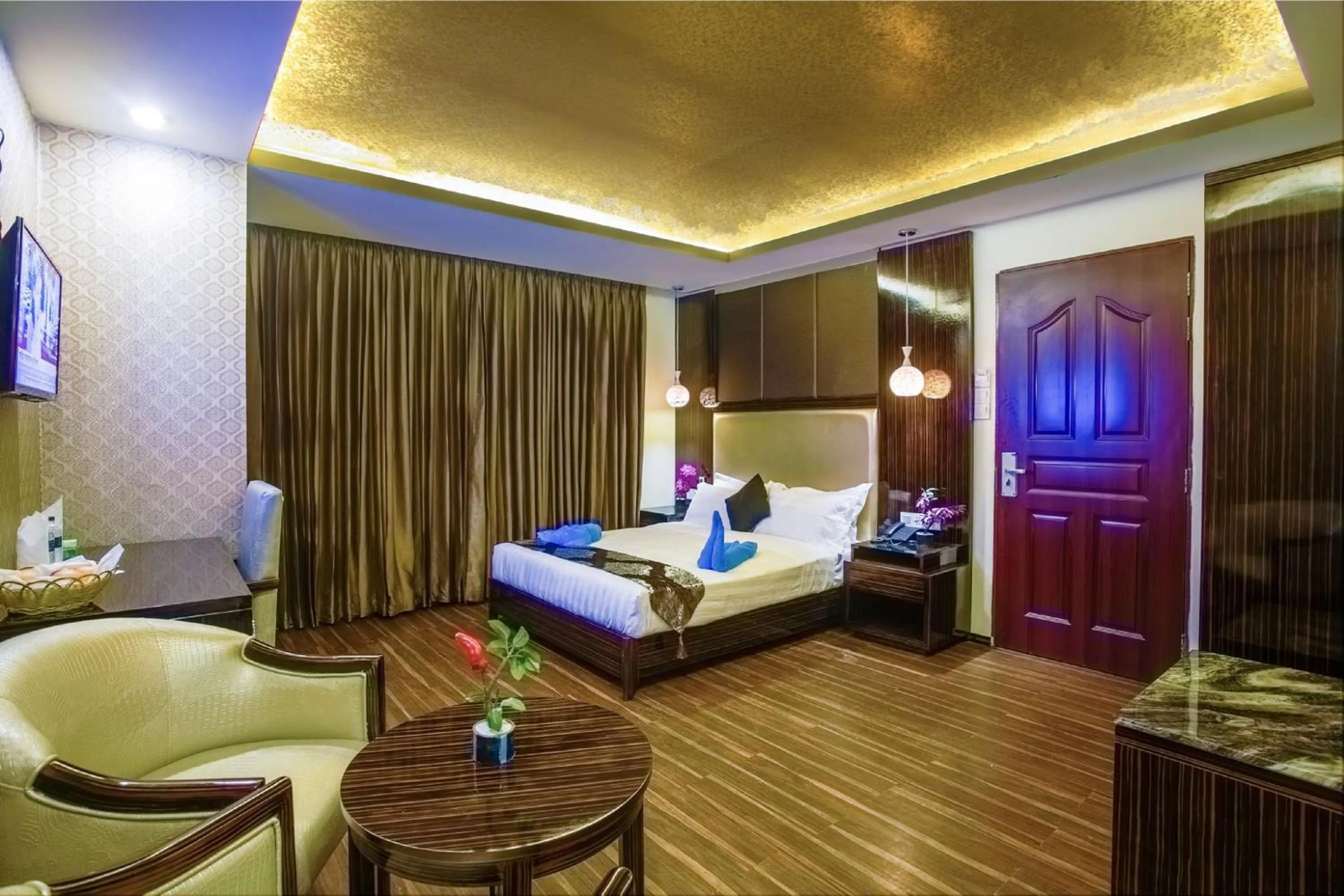 Living room, Bed in Hotel Noorjahan Grand
