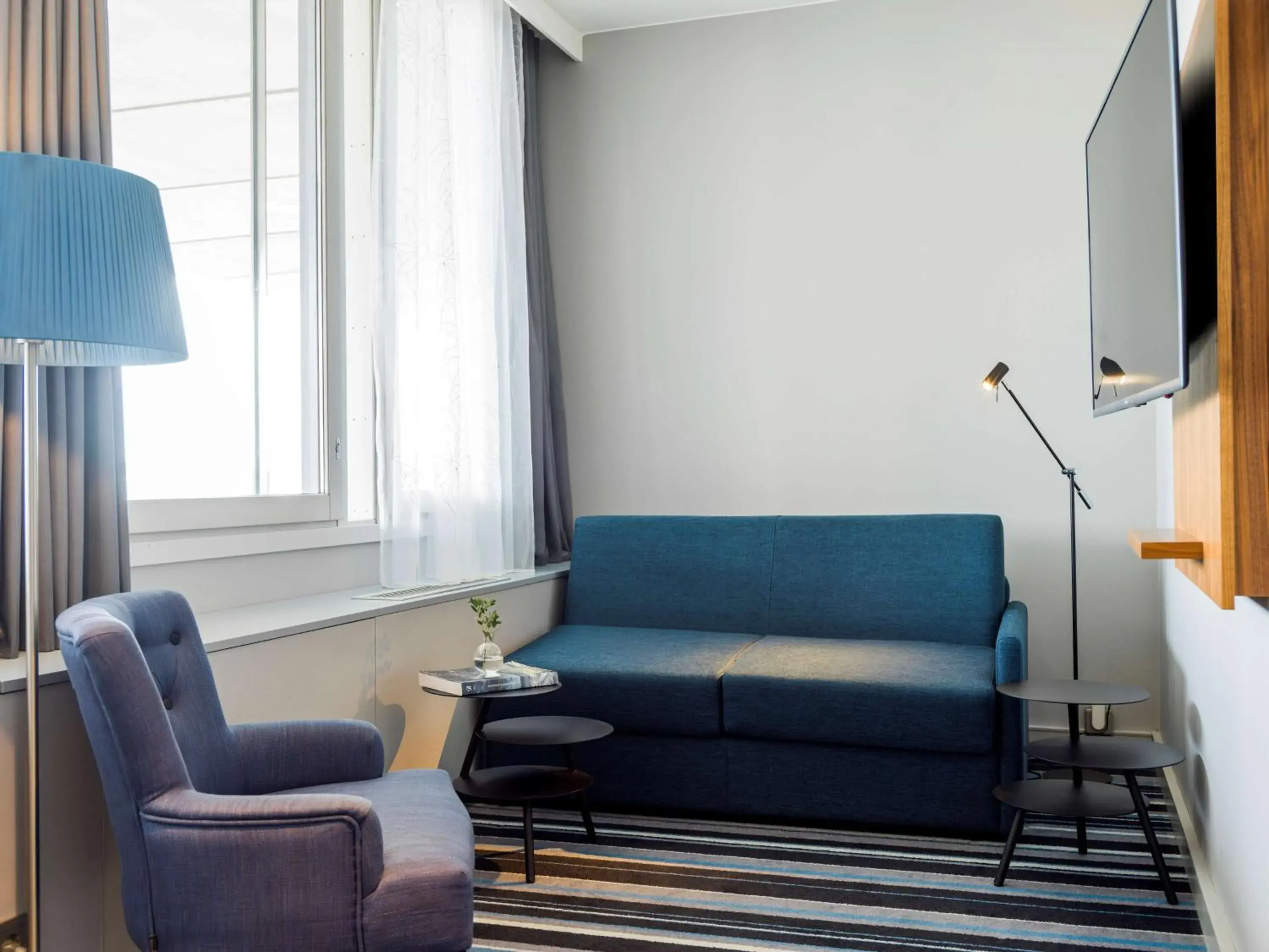 Photo of the whole room in Radisson Blu Airport Terminal Hotel Photo of the whole room in Radisson Blu Airport Terminal Hotel