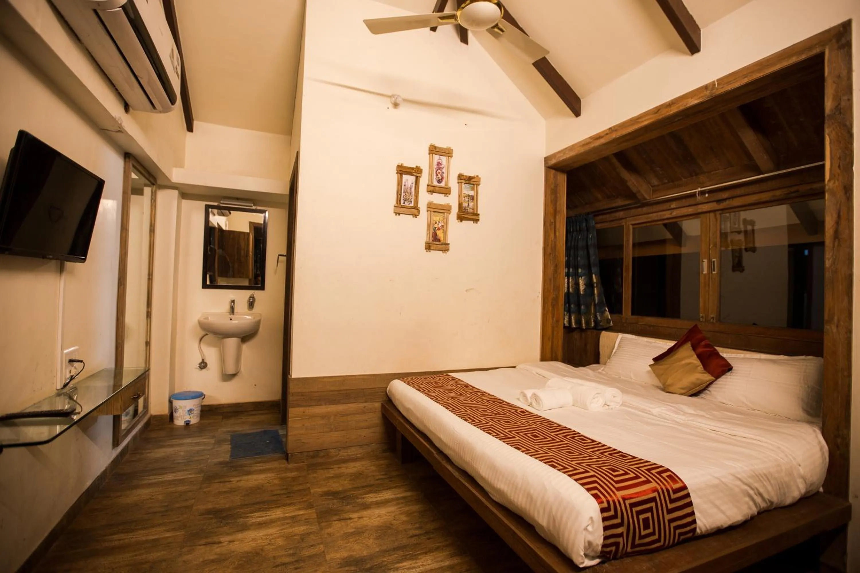 Photo of the whole room, Bed in Kaular Atithis Grand Kokan Resort