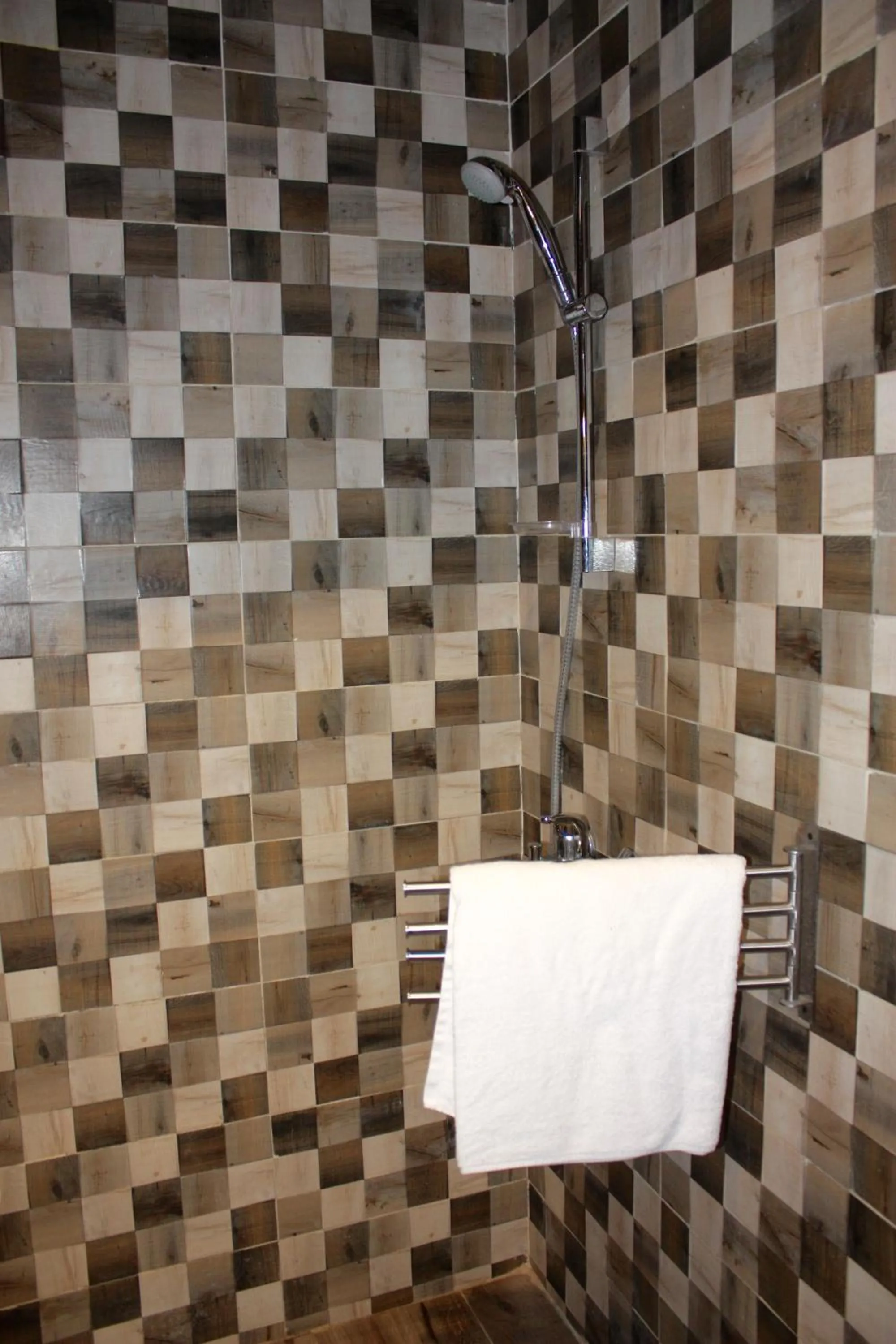 Shower in Nakhil Inn Residence