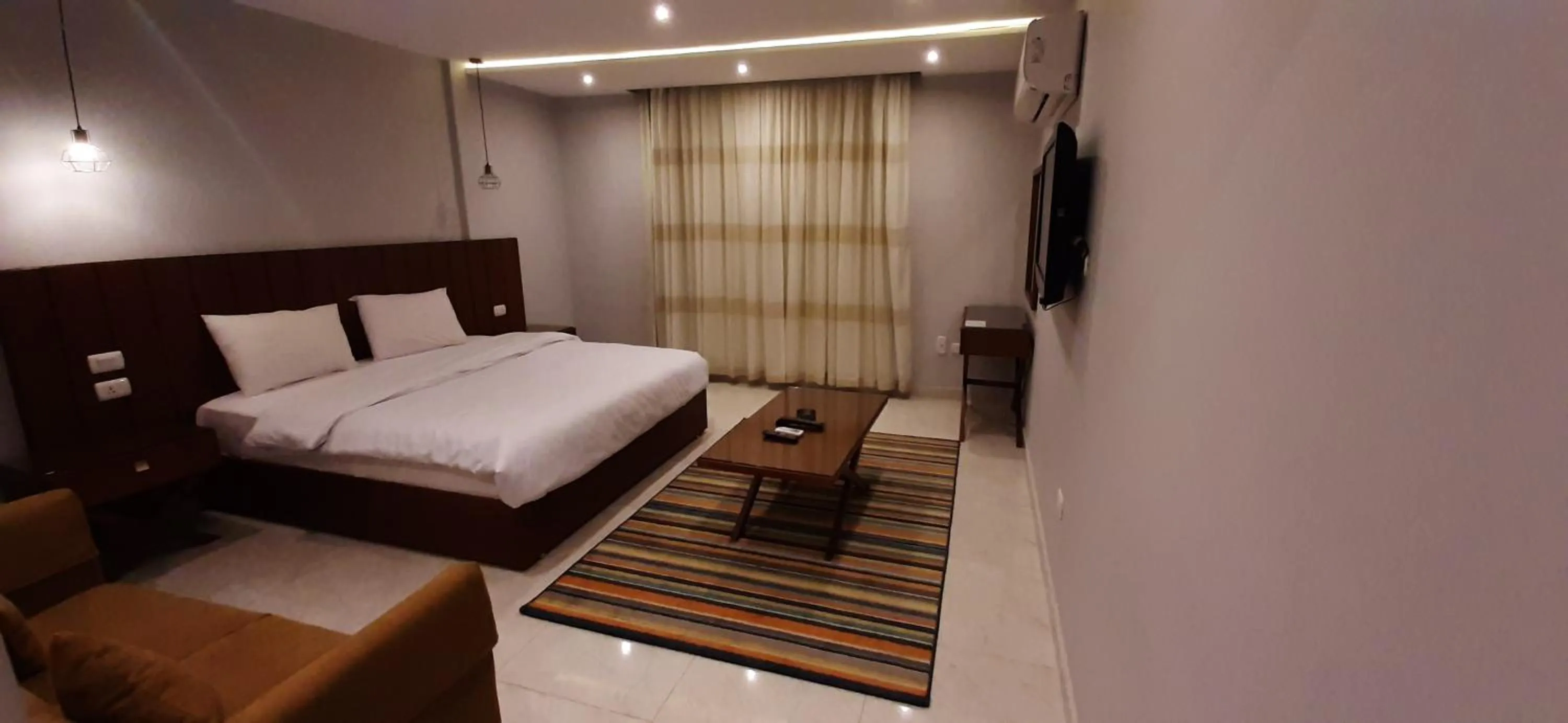 Bedroom, Bed in Nakhil Inn Residence