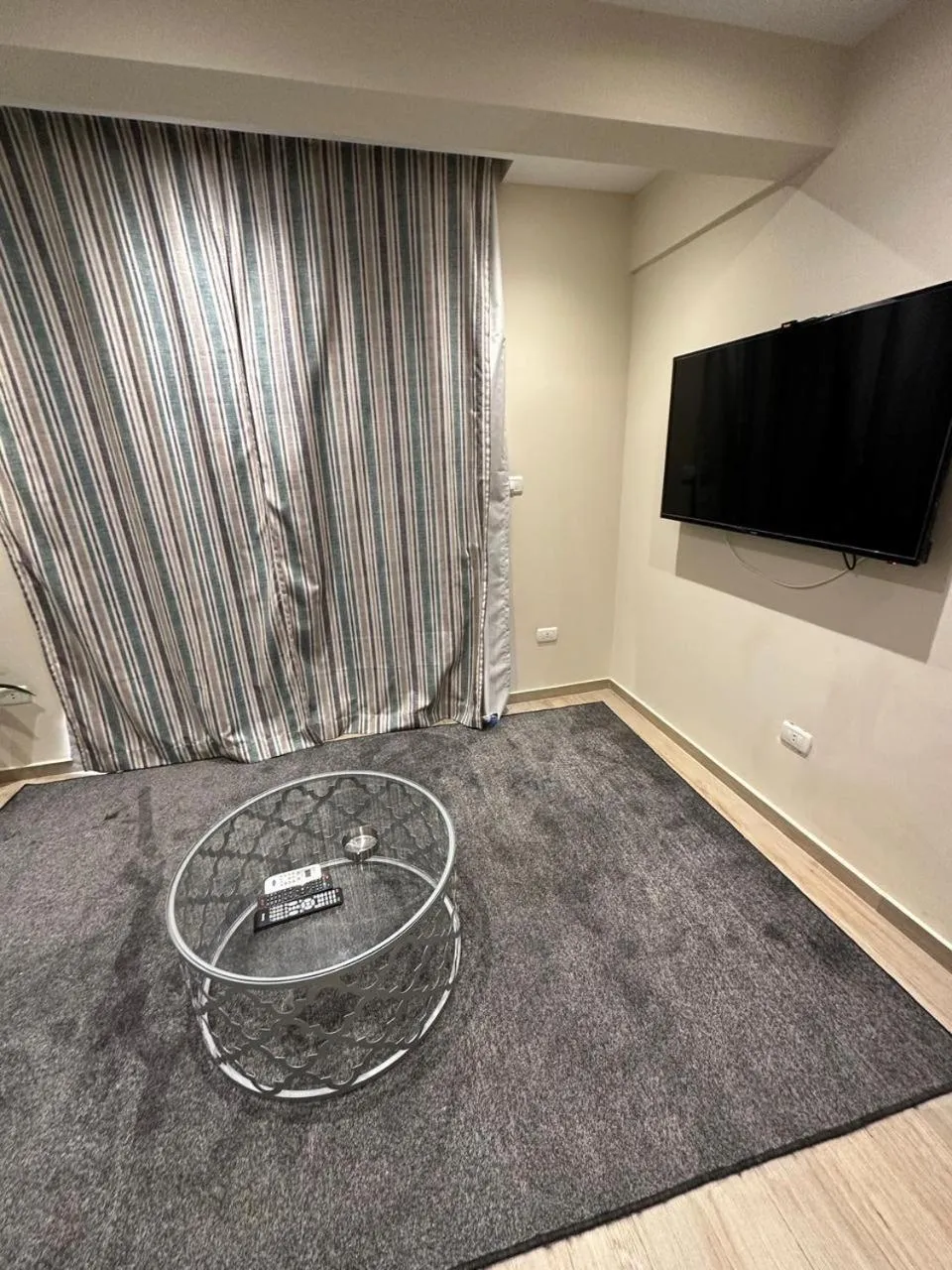 Communal lounge/ TV room in Nakhil Inn Residence