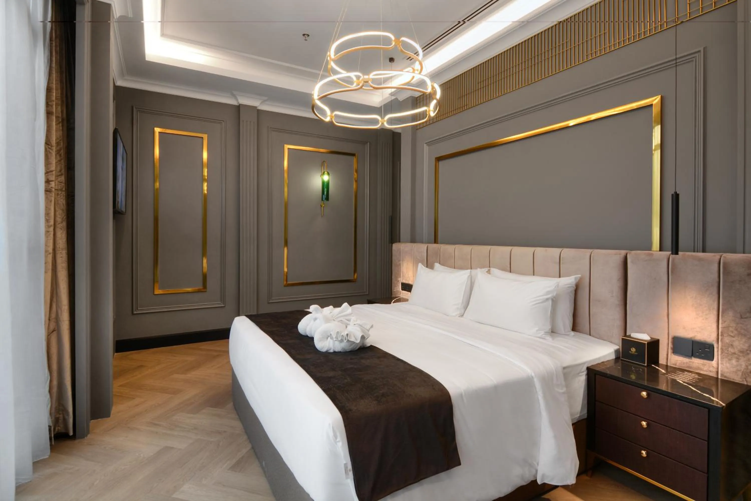 Bed in The Granite Luxury Hotel Penang