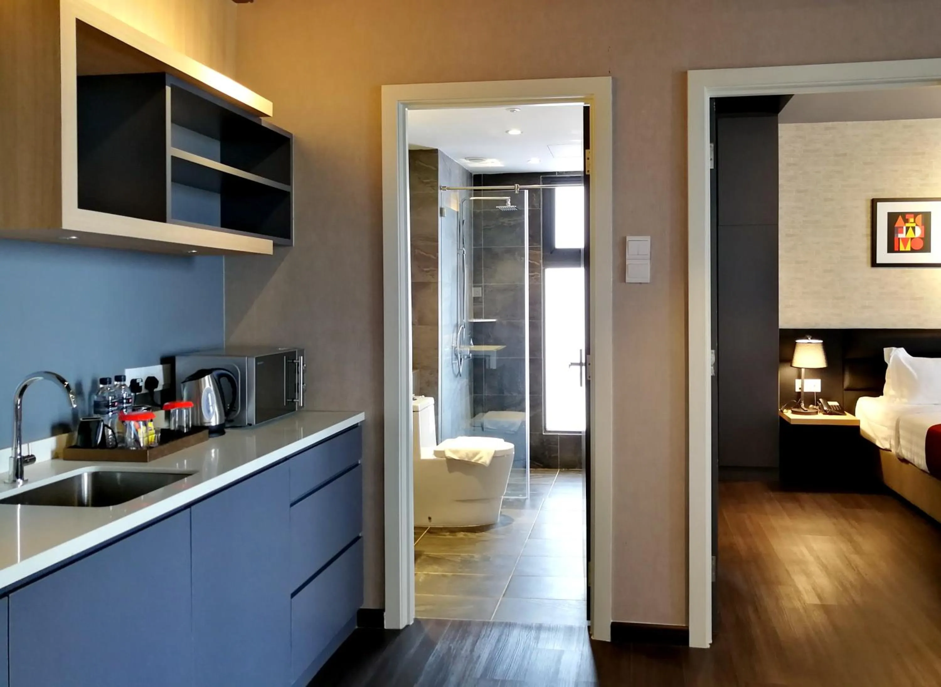 Toilet, Bed in The Granite Luxury Hotel Penang