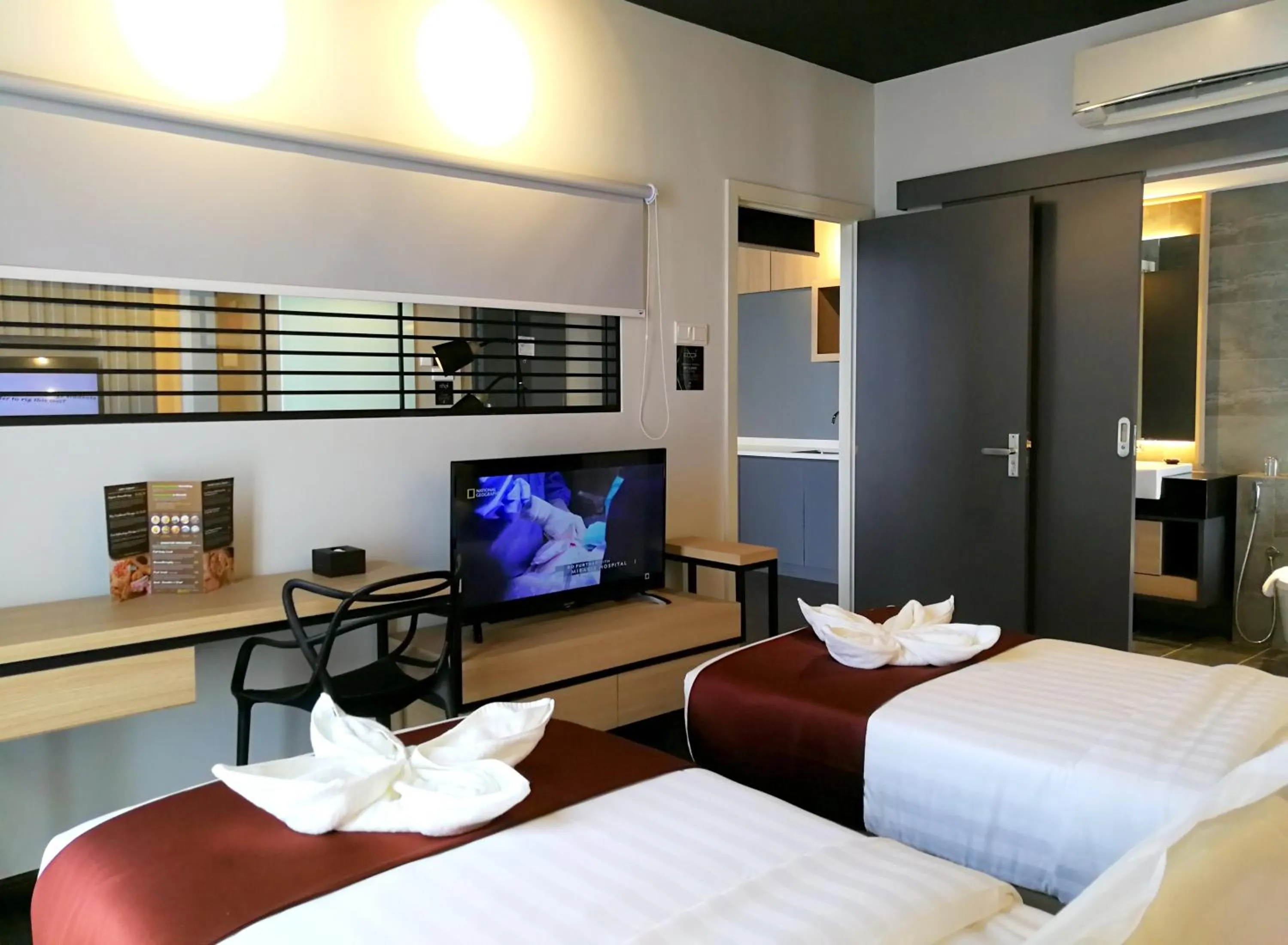 Bed in The Granite Luxury Hotel Penang