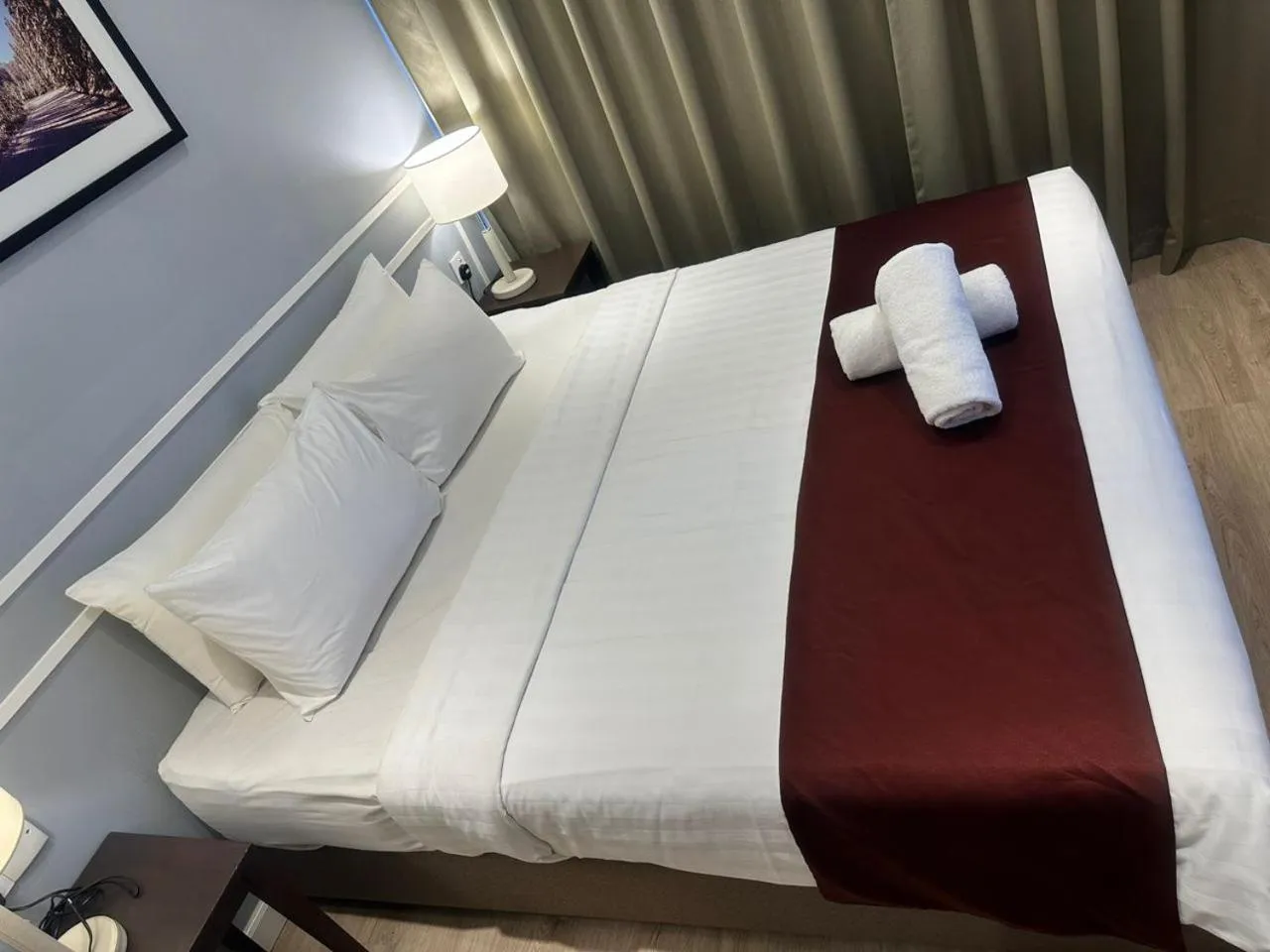Bed in The Granite Luxury Hotel Penang