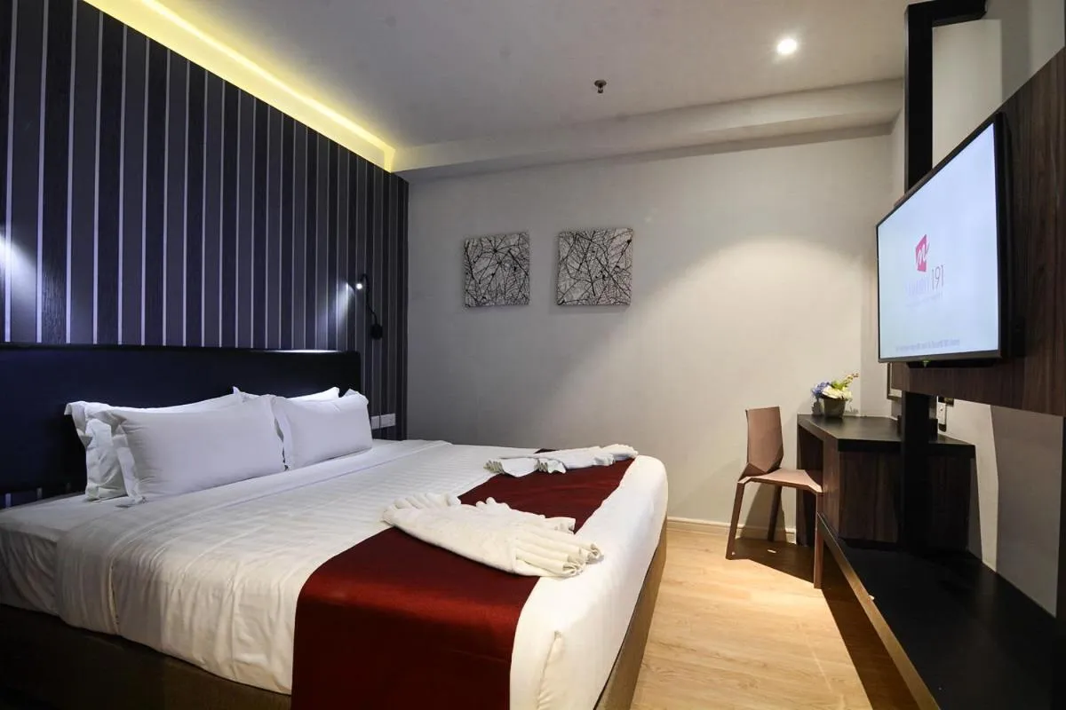 Bed in The Granite Luxury Hotel Penang