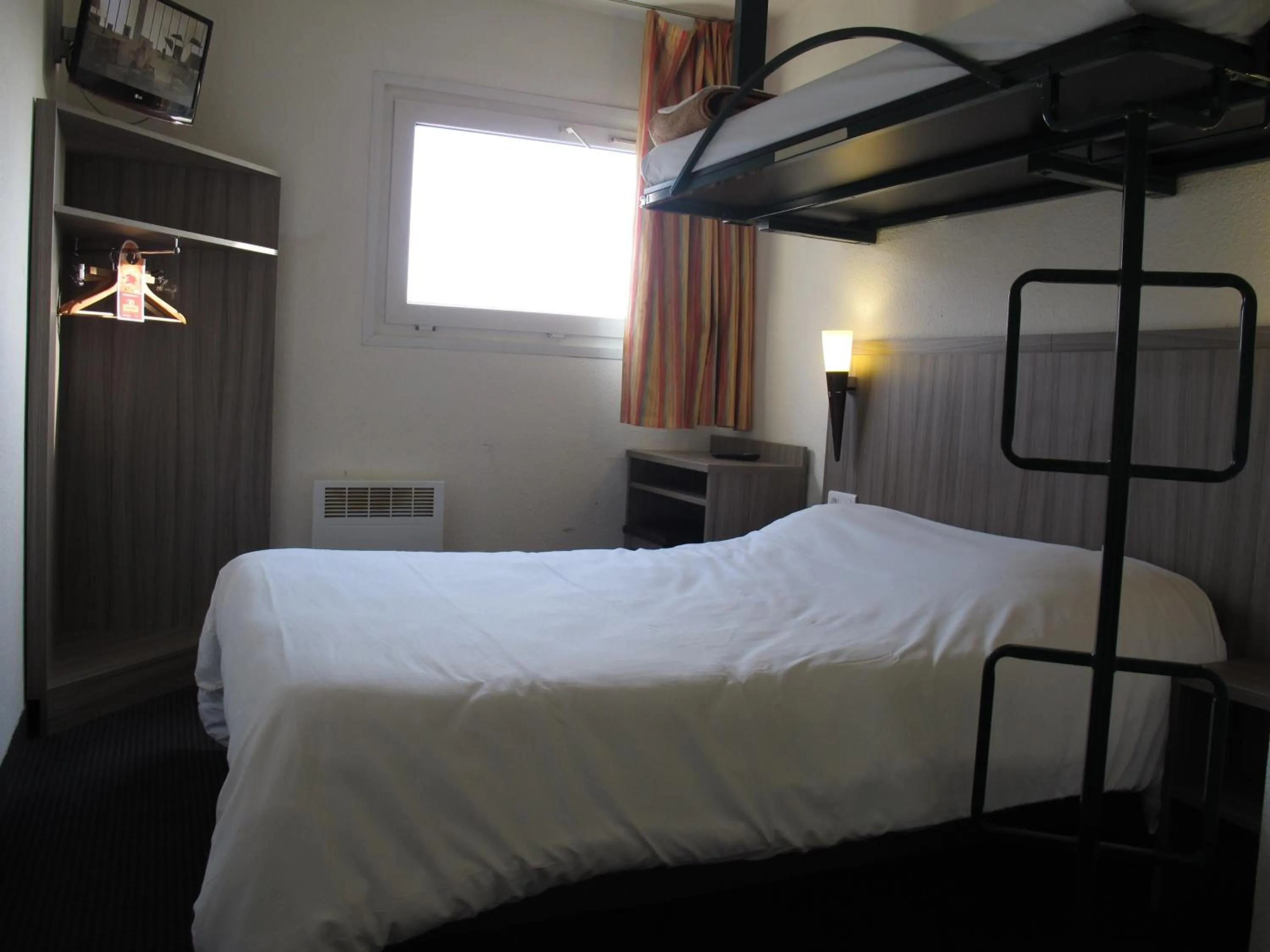 Bed in Initial by Balladins Béthune