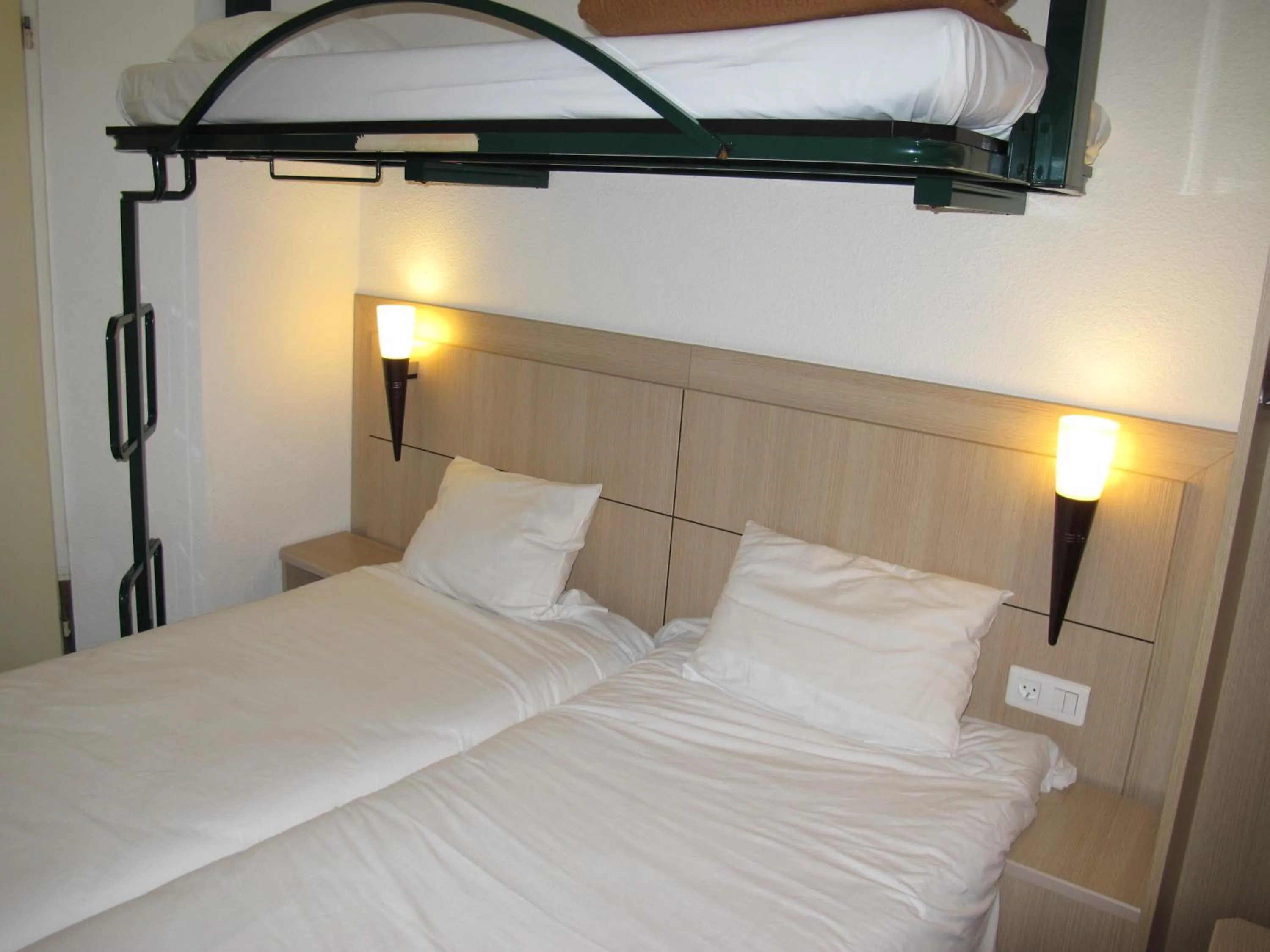 Bed in Initial by Balladins Béthune