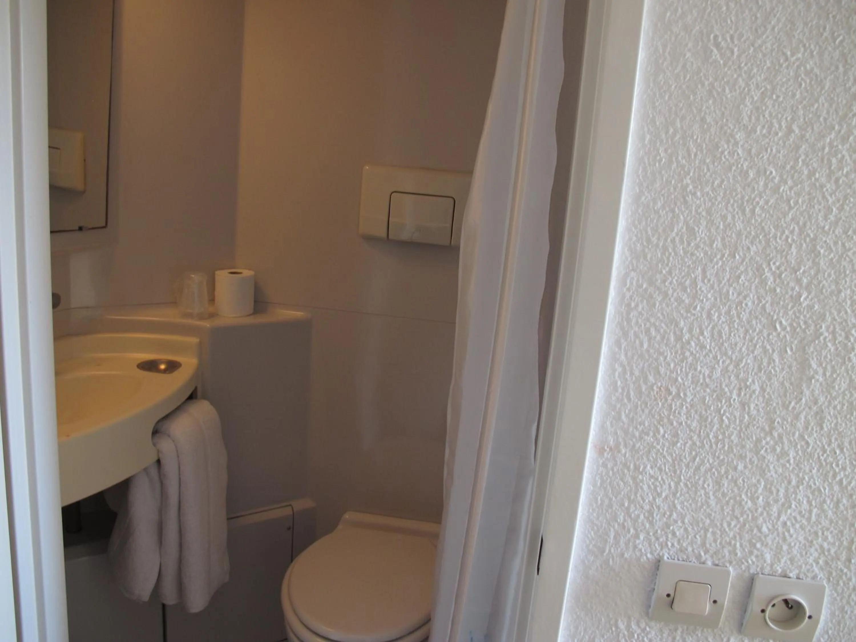 Bathroom in Initial by Balladins Béthune