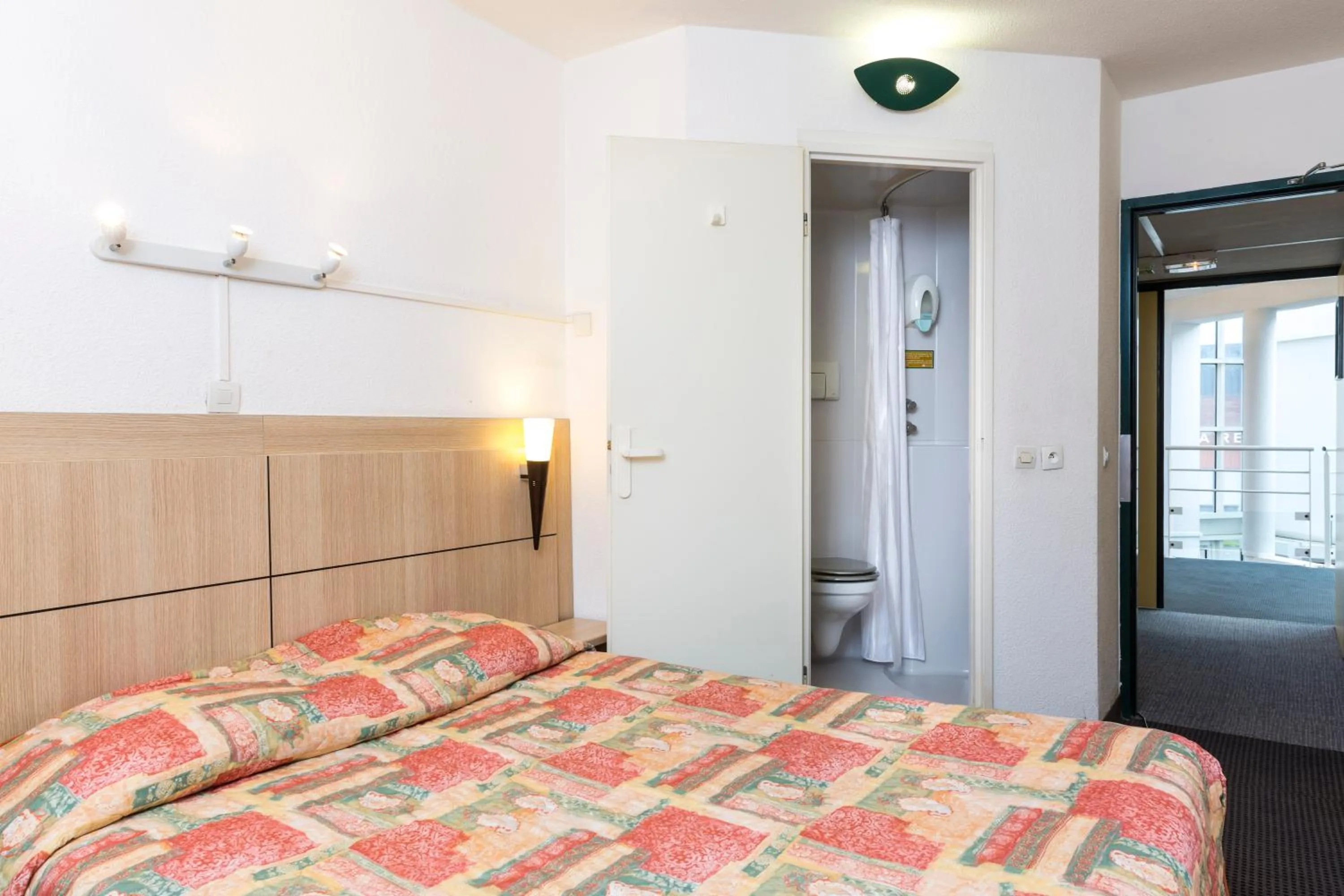 Bed in Initial by Balladins Béthune