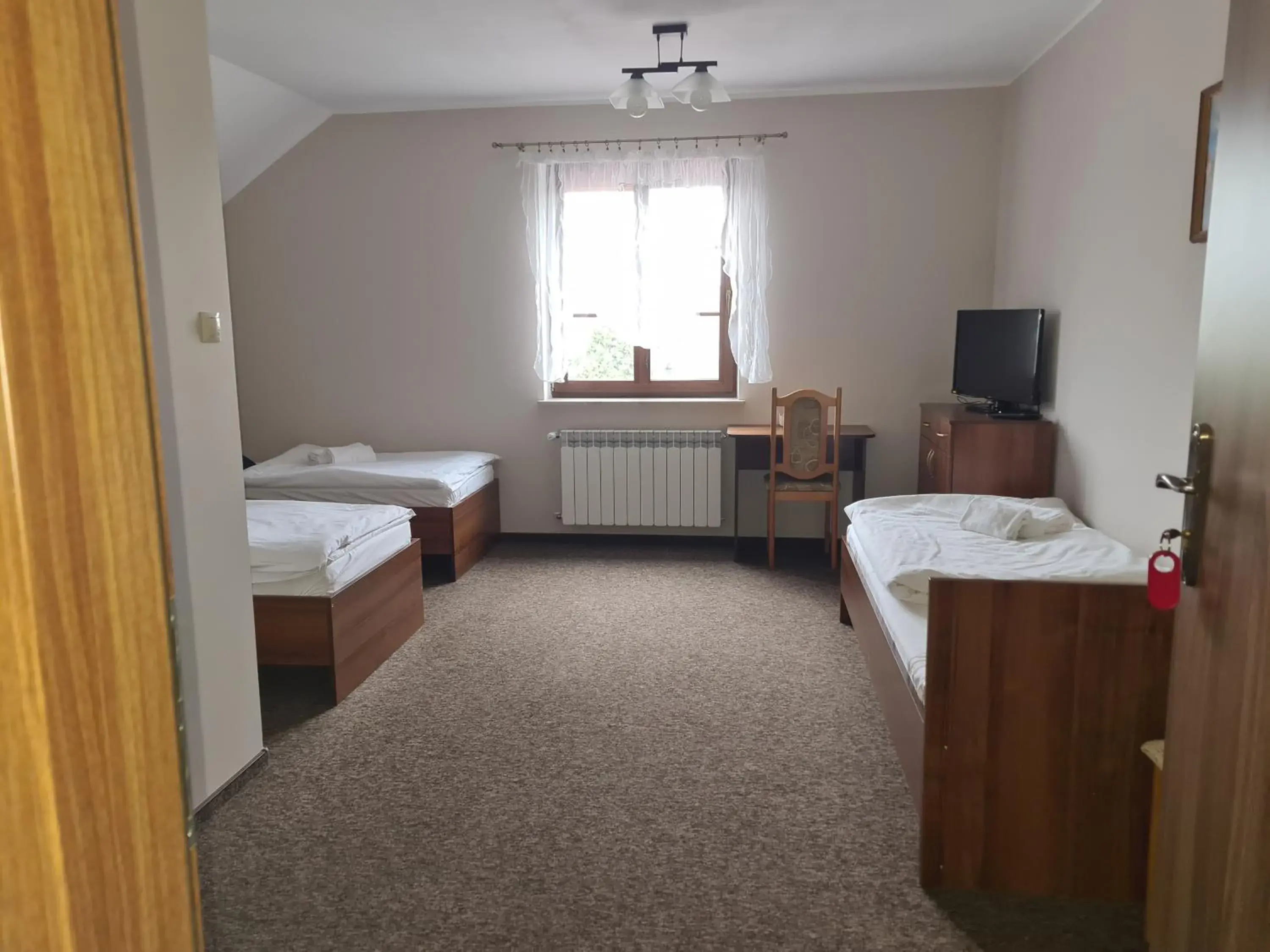 Triple Room with Bathroom in Gościniec Oaza Sorkwity Triple Room with Bathroom in Gościniec Oaza Sorkwity